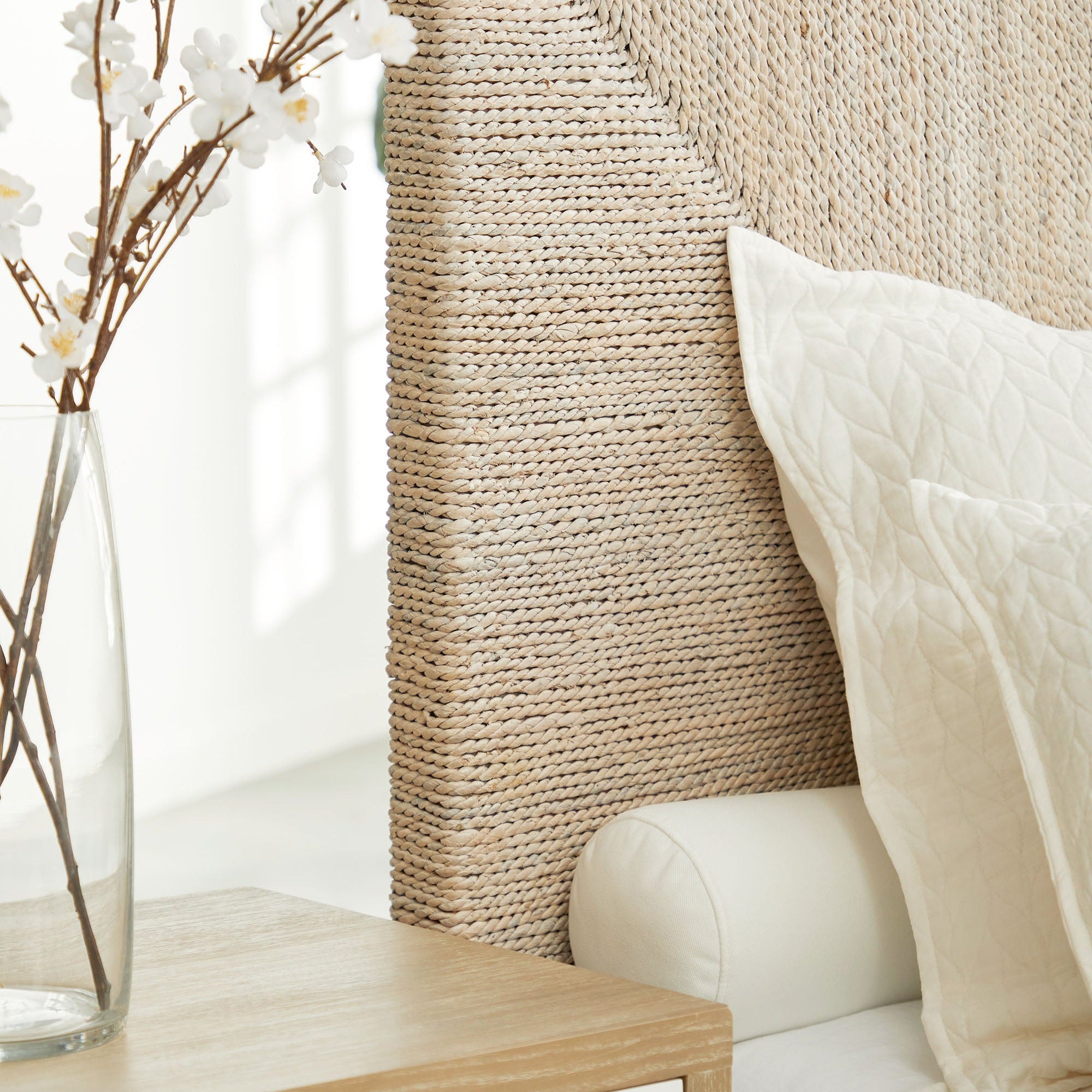 Close-up of Malay Standard King Bed handwoven abaca rope headboard and white bedding by Essentials for Living