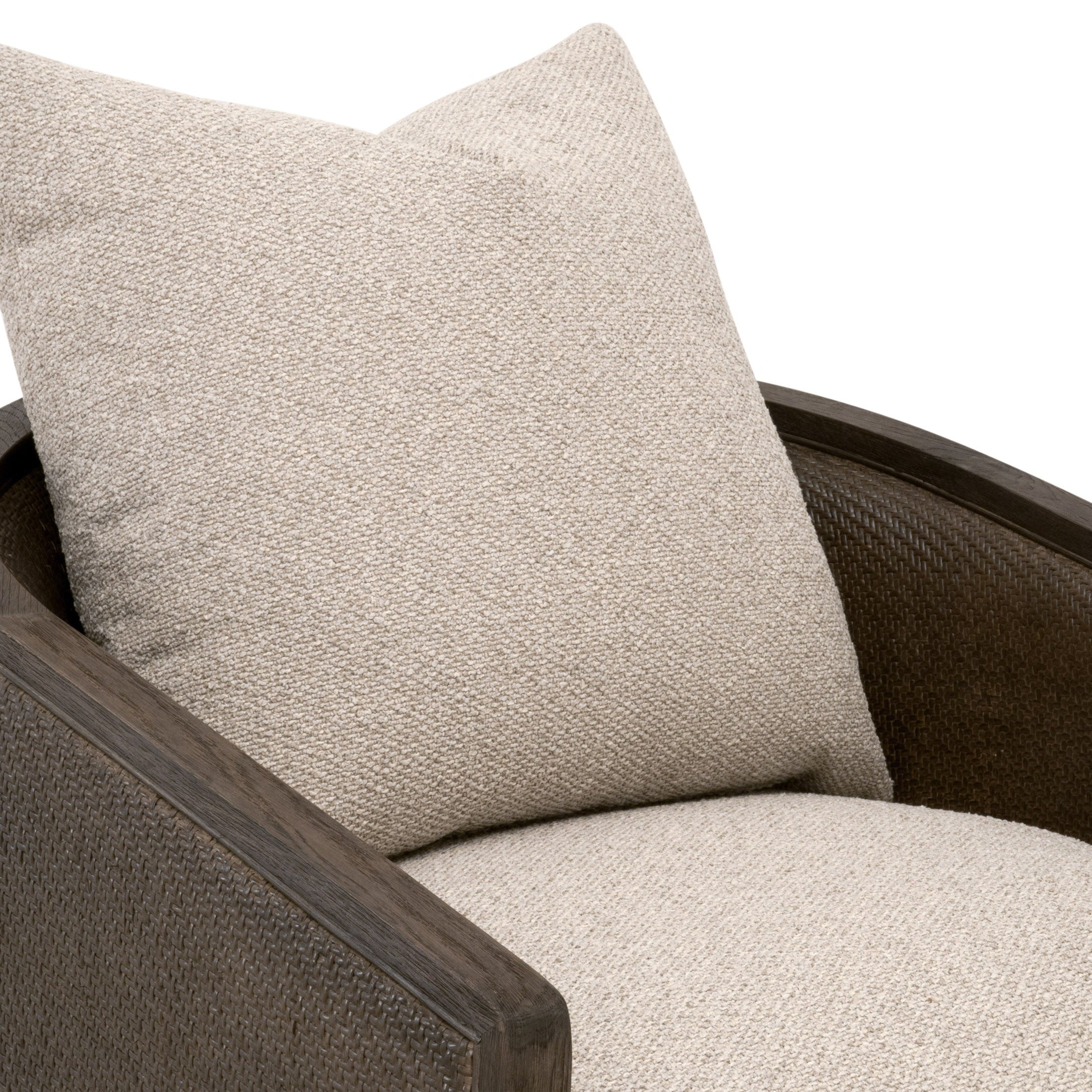 Close-up of Essentials for Living McGuire Swivel Club Chair with gray cane frame and Snow Boucle cushion