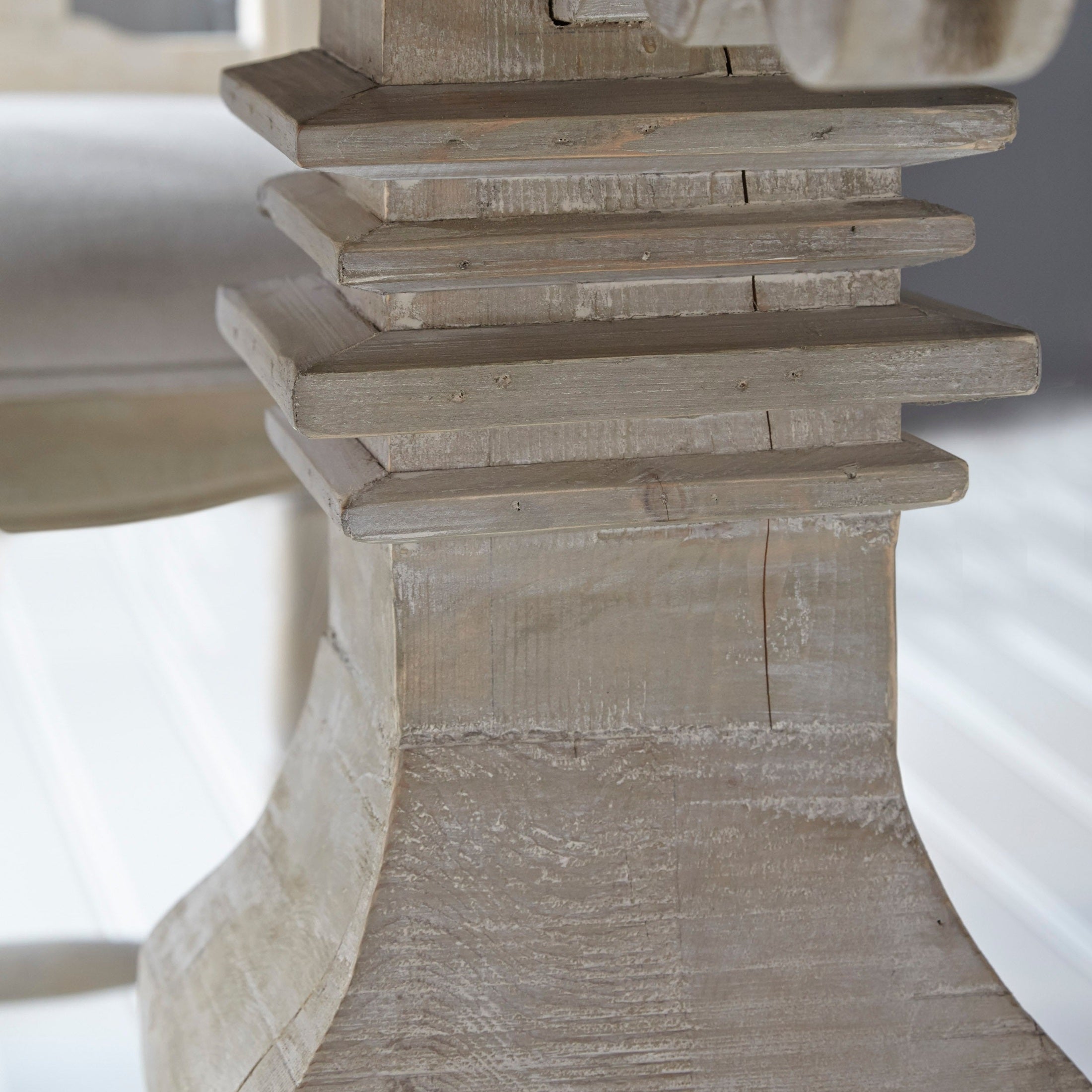 Close-up of the trestle base with distressed reclaimed wood finish on Monastery Extension Dining Table by Essentials For Living