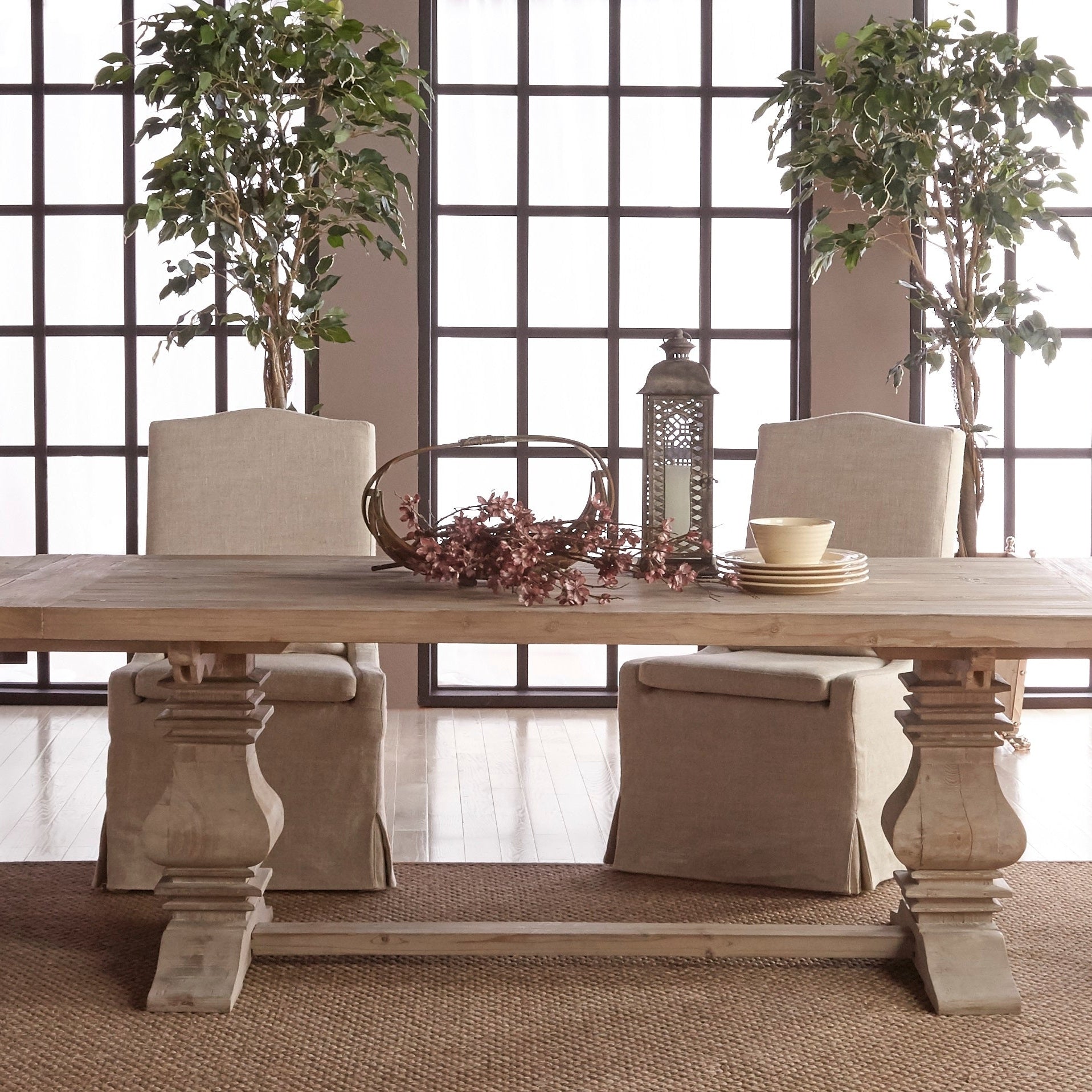 Monastery Extension Dining Table with rustic trestle base and reclaimed wood finish by Essentials for Living