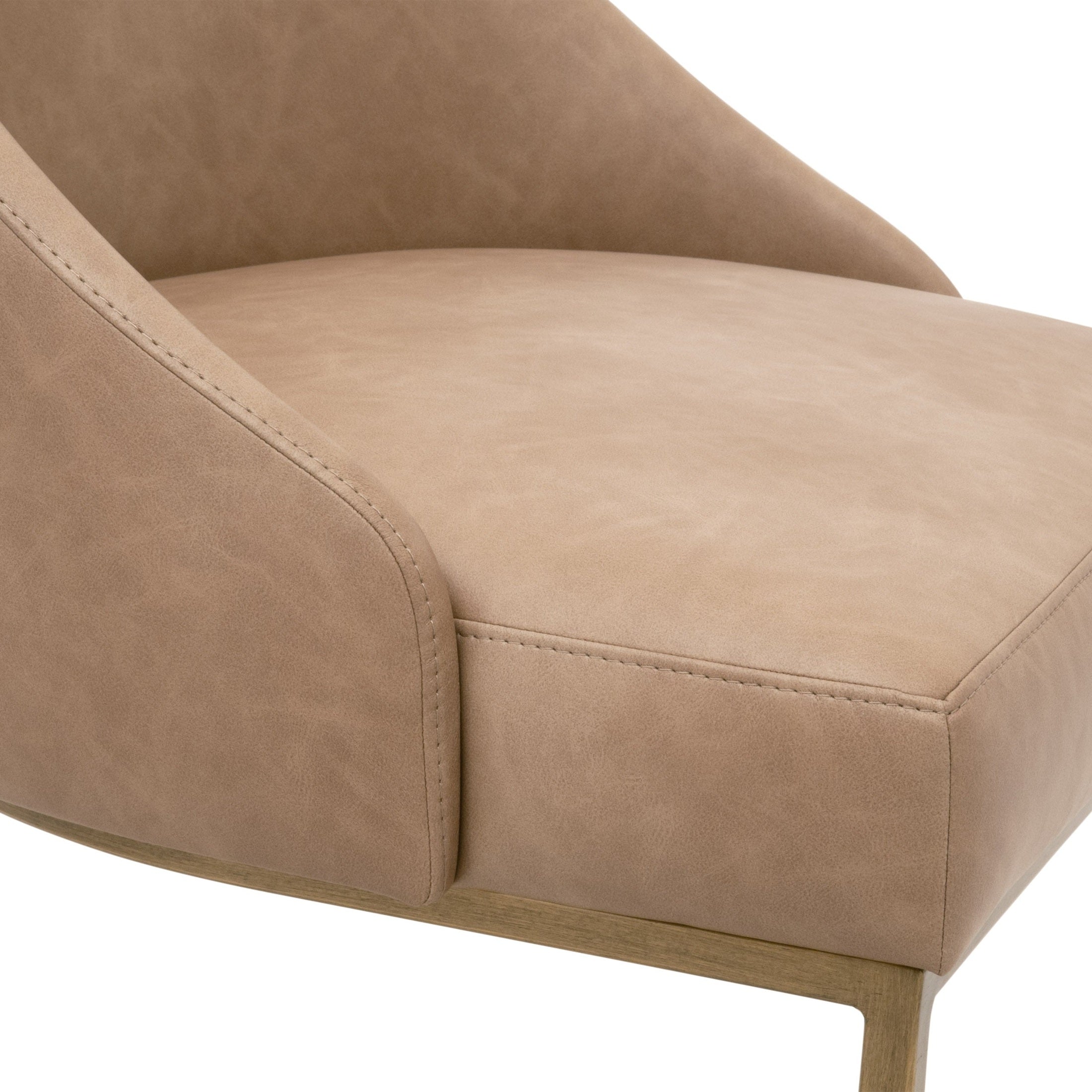 Close-up of Ivanhoe Toast vegan leather upholstery and brushed gold steel base on Parissa Dining Chair by Essentials for Living