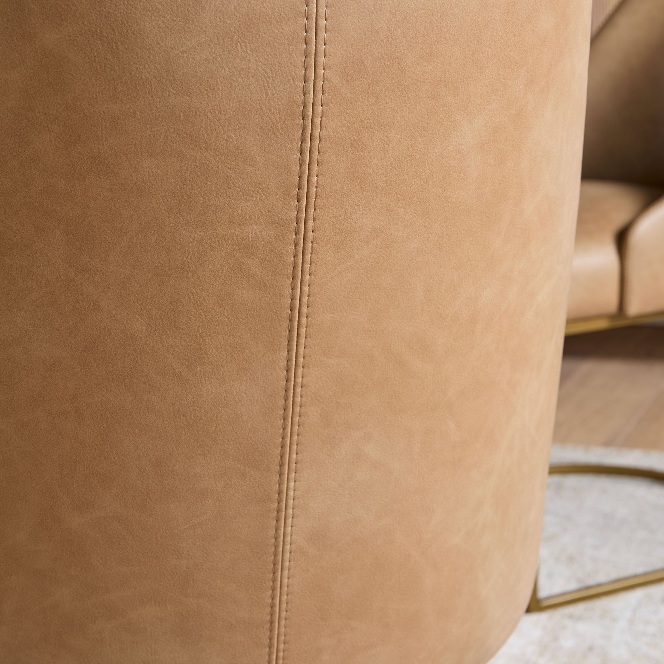 Close-up of Ivanhoe Toast vegan leather upholstery with detailed stitching on Parissa Dining Chair by Essentials For Living