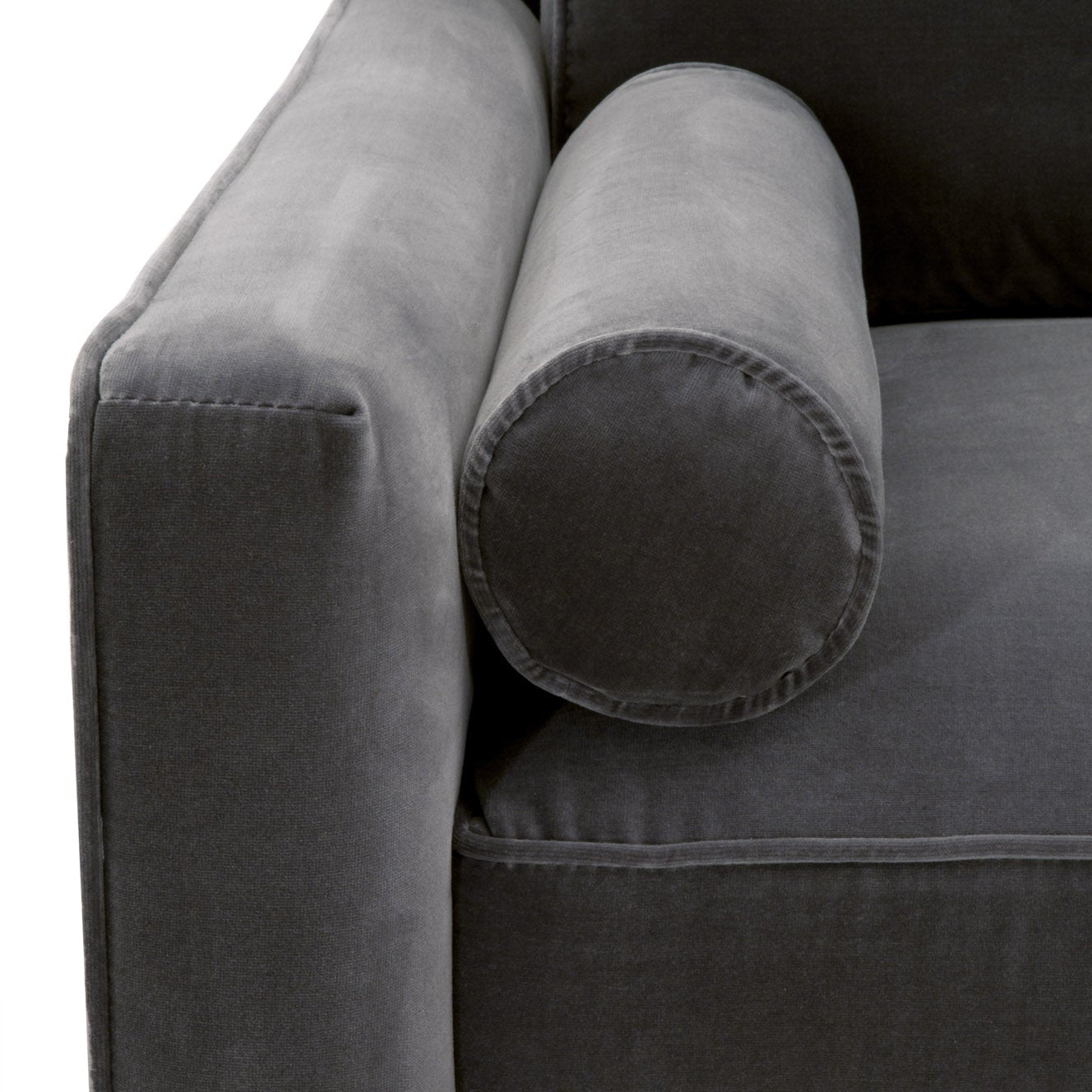 Close-up of Essentials For Living Parker Post Modern Sofa Chair in plush gray velvet with round bolster pillow and clean lines