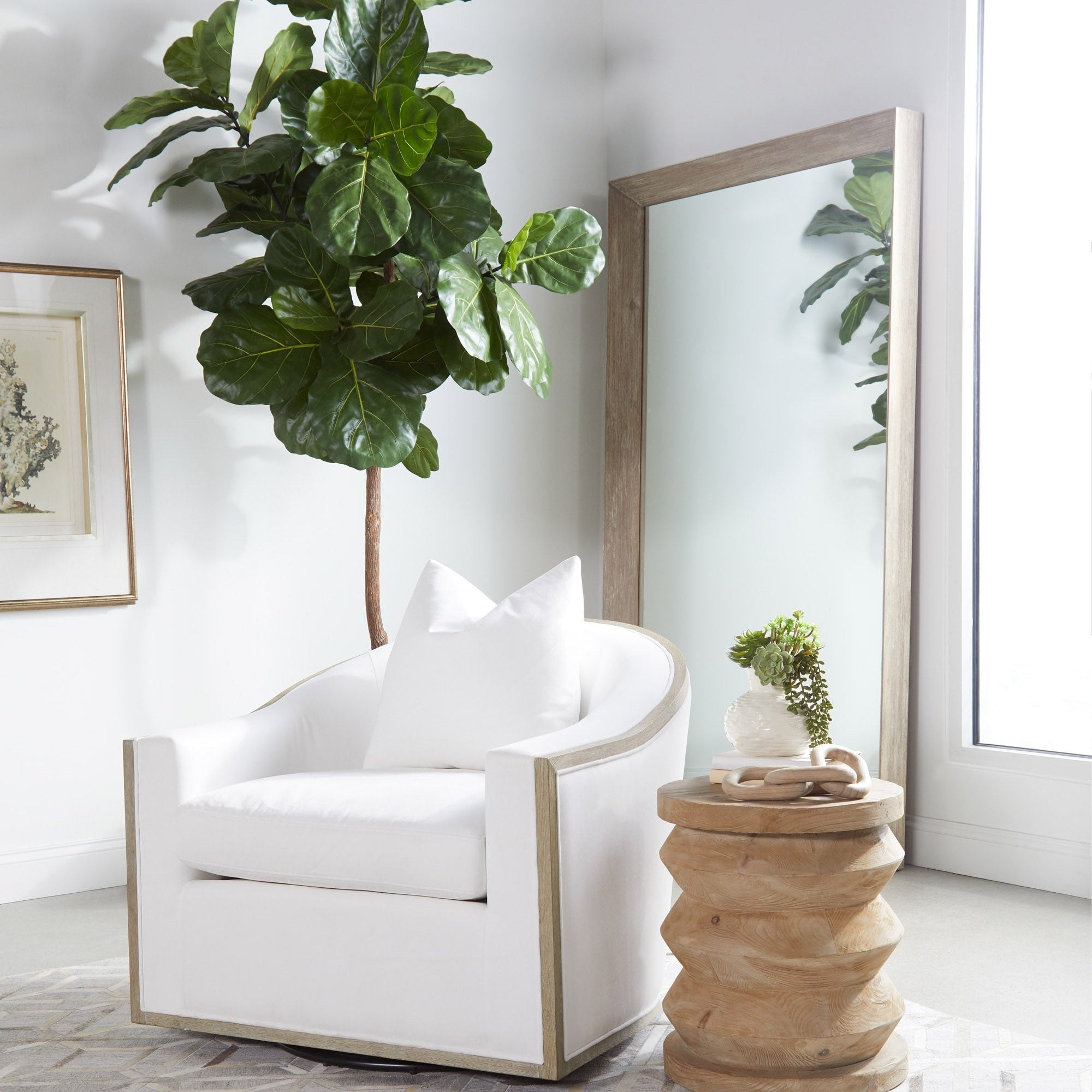 Essentials For Living Paxton swivel club chair in white with wood trim, plush cushion, and cozy throw pillow in stylish room setup