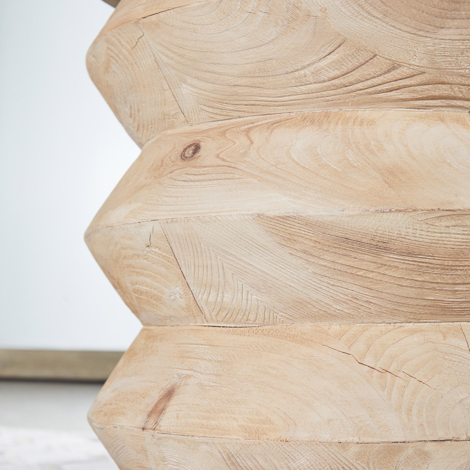 Close-up of natural reclaimed pine wood texture on Essentials For Living Pier Accent Table with geometric detailing