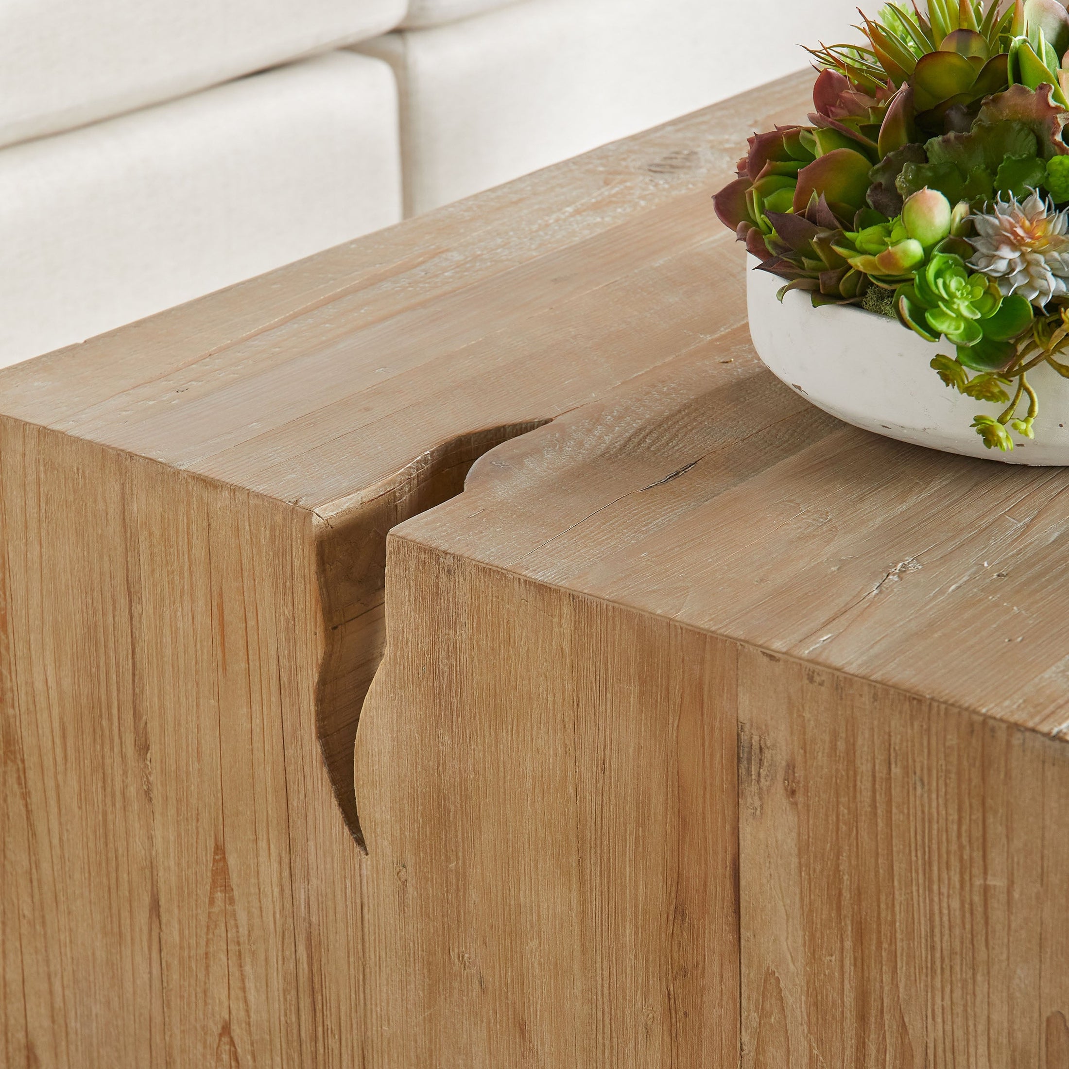 Close-up of Reed Coffee Table with faux split hole and natural wood grain detail by Essentials For Living