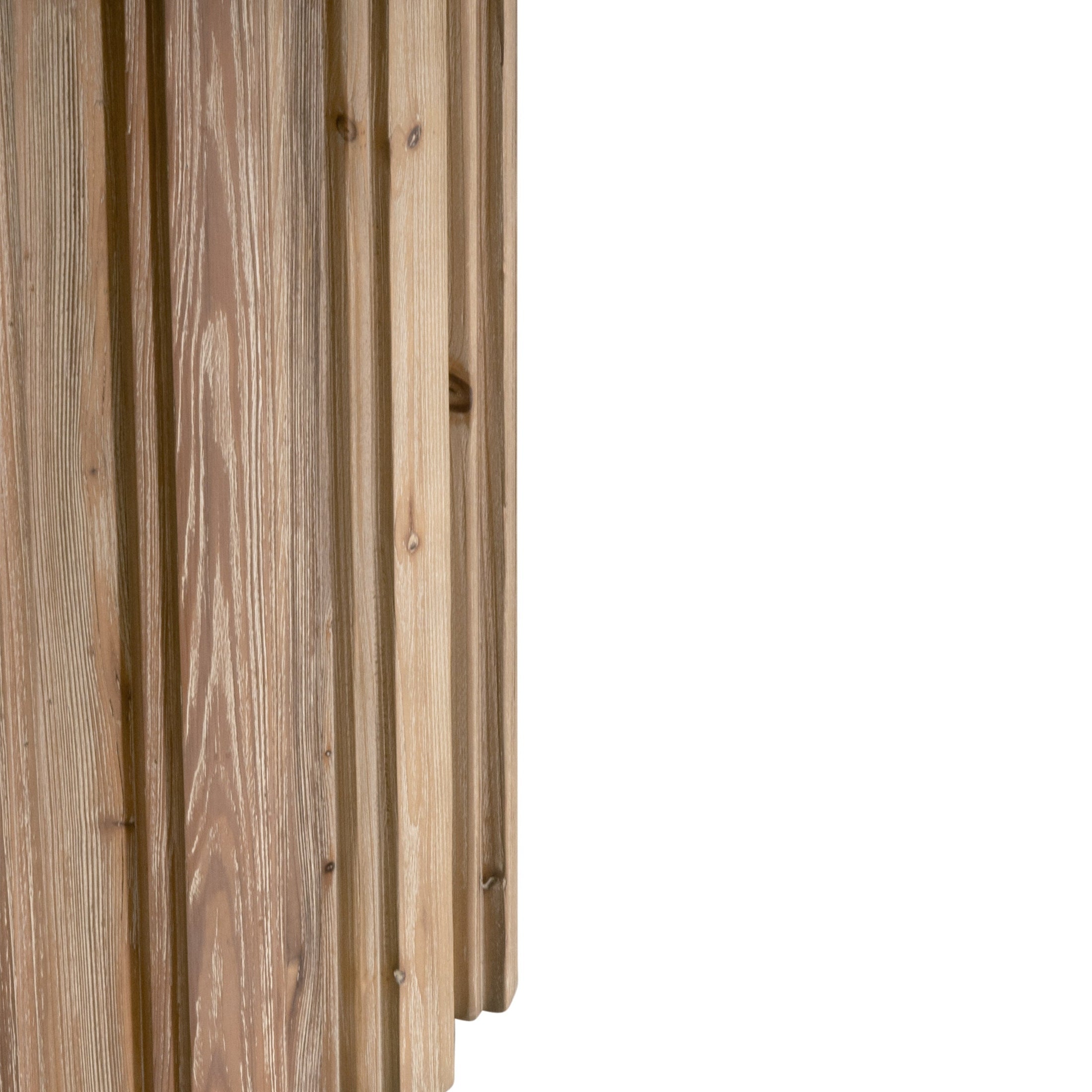 Close-up of the decorative fluted pedestal on the Roma 54" Round Dining Table by Essentials for Living.