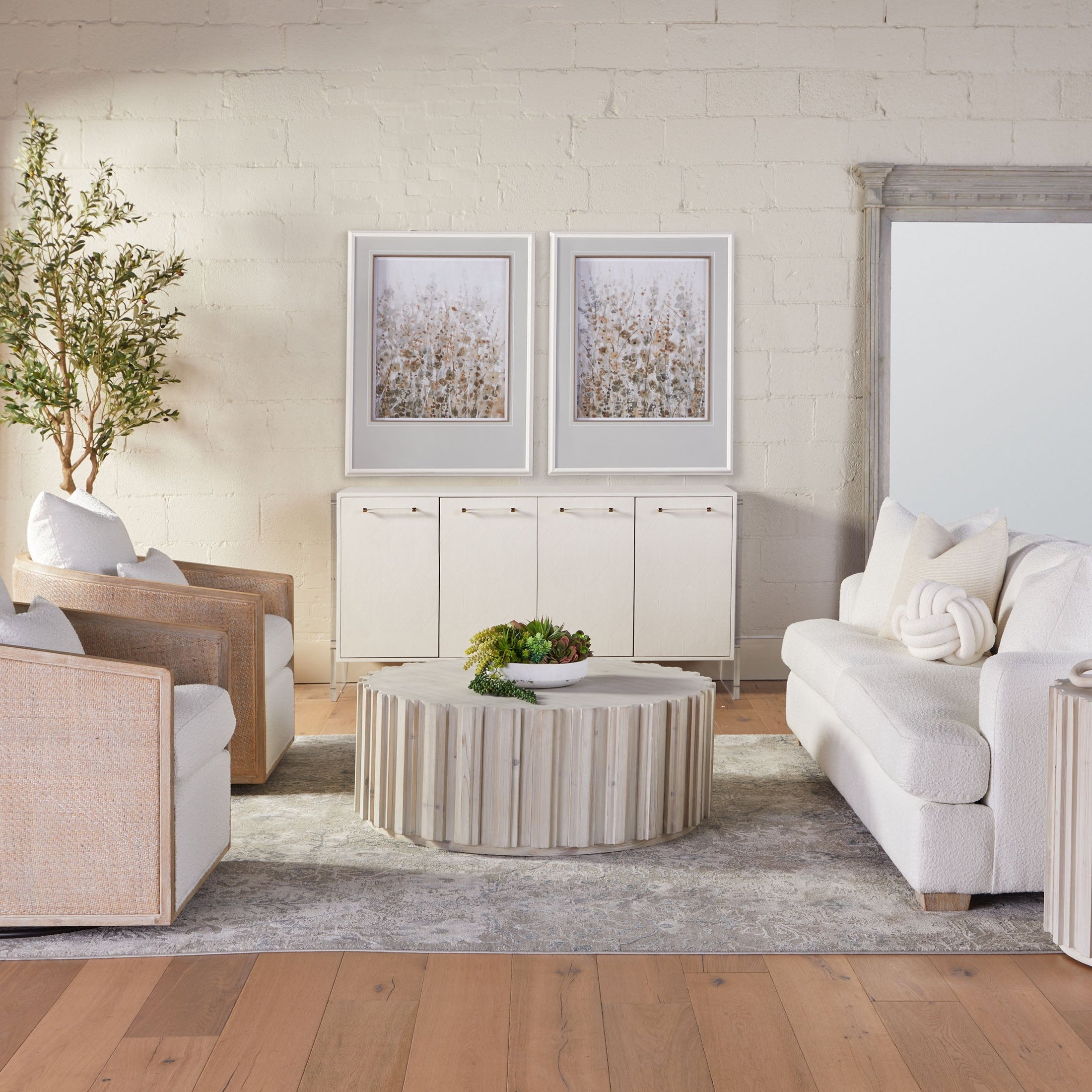 Round Roma Coffee Table by Essentials for Living with whitewash reclaimed pine and decorative wood fluting in stylish living room.