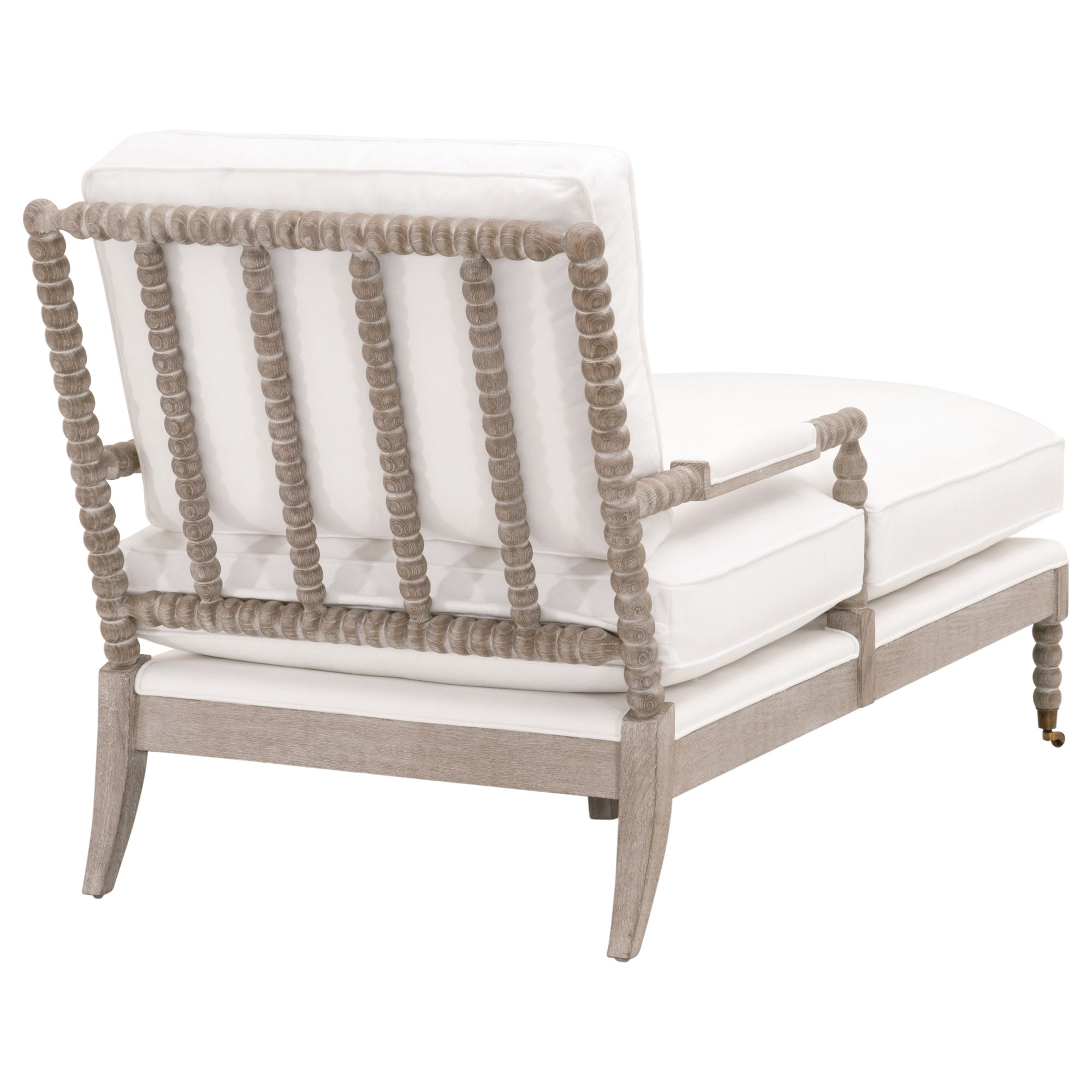Rouleau Chaise Lounge with carved spool-style oak frame and white cushions by Essentials for Living
