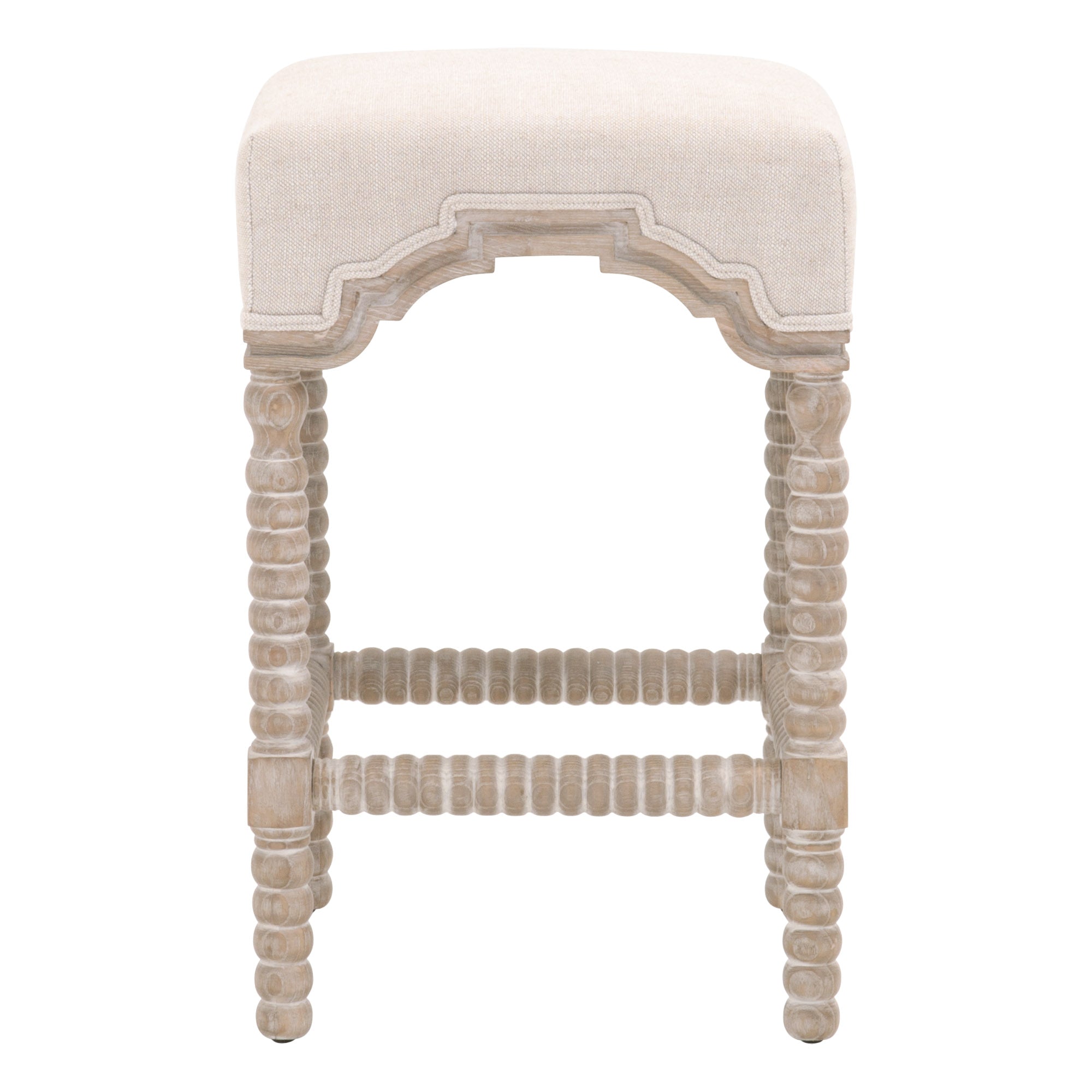 Rue Counter Stool by Essentials for Living with bisque linen upholstery and carved natural gray ash wood legs
