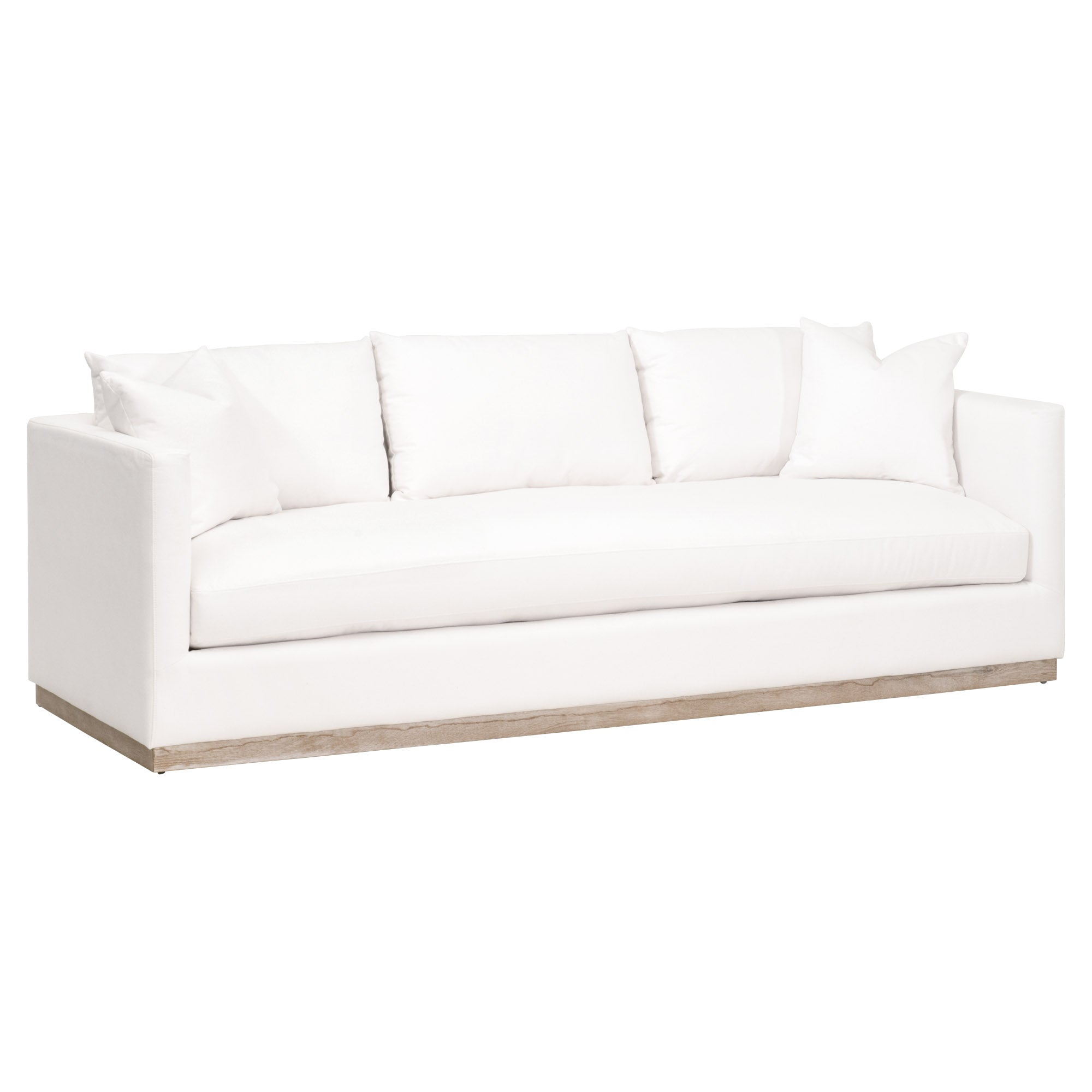 Essentials for Living Siena 96" ivory sofa with plush cushions and wood plinth base in a modern living room style