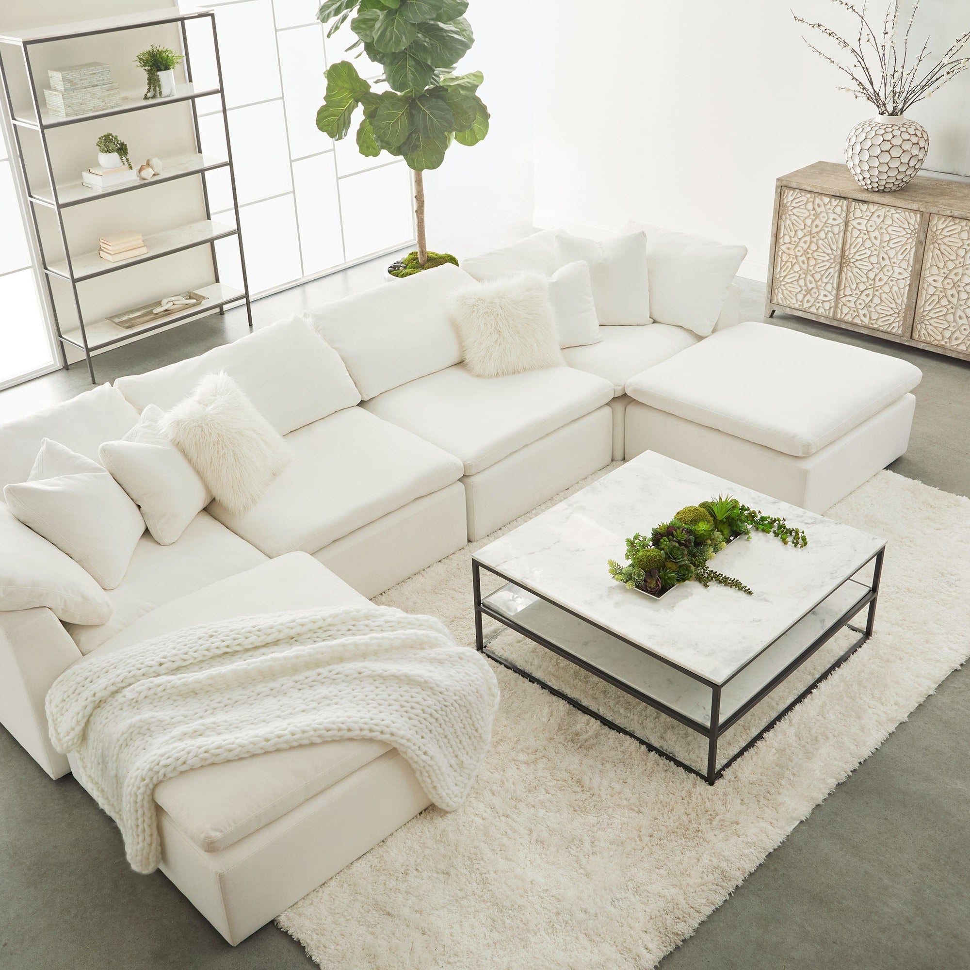 Essentials for Living Sky Modular sectional with white armless chair, plush cushions, and modern clean design in bright living room