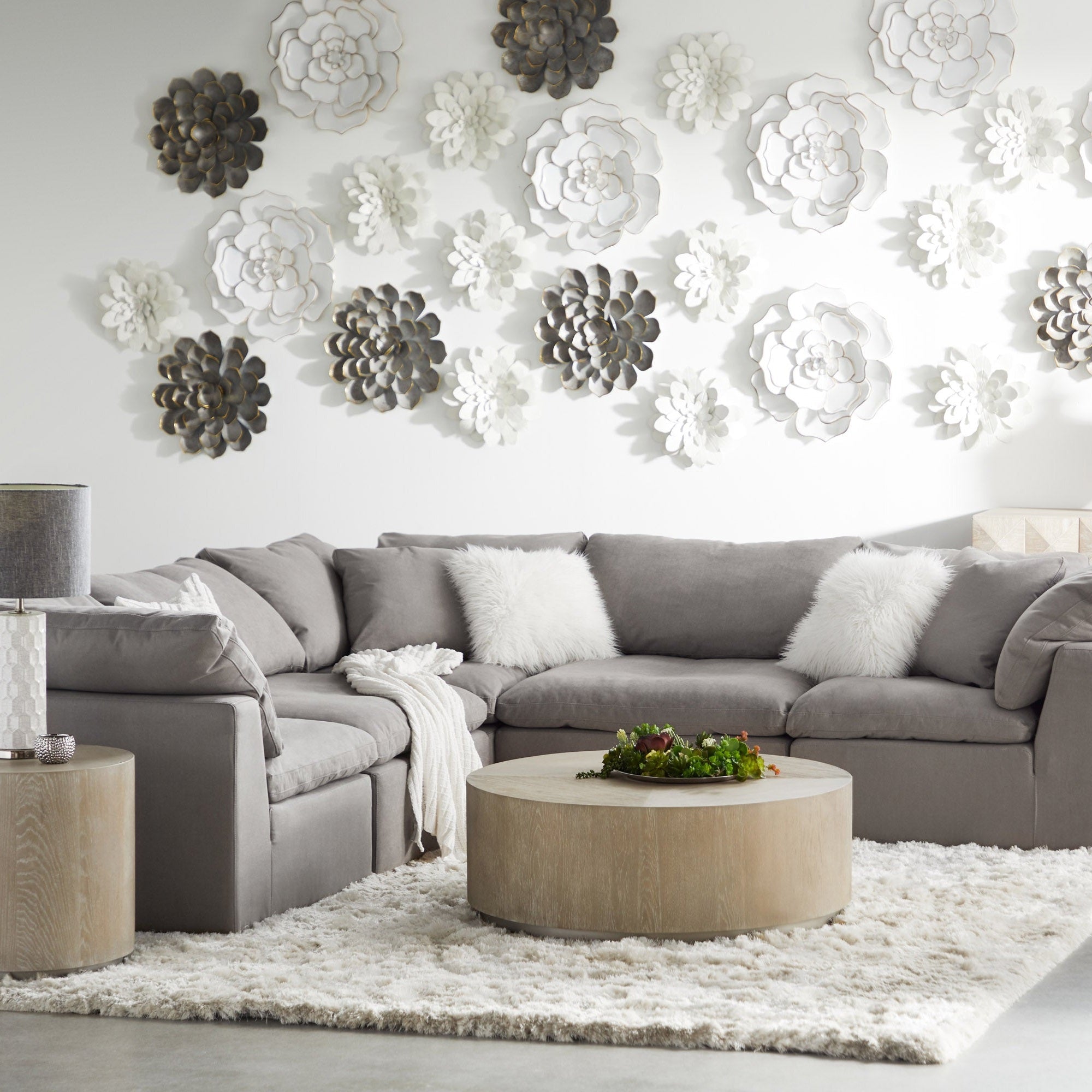 Essentials for Living Sky Modular Armless Chair in gray with plush cushions in a modern living room setting