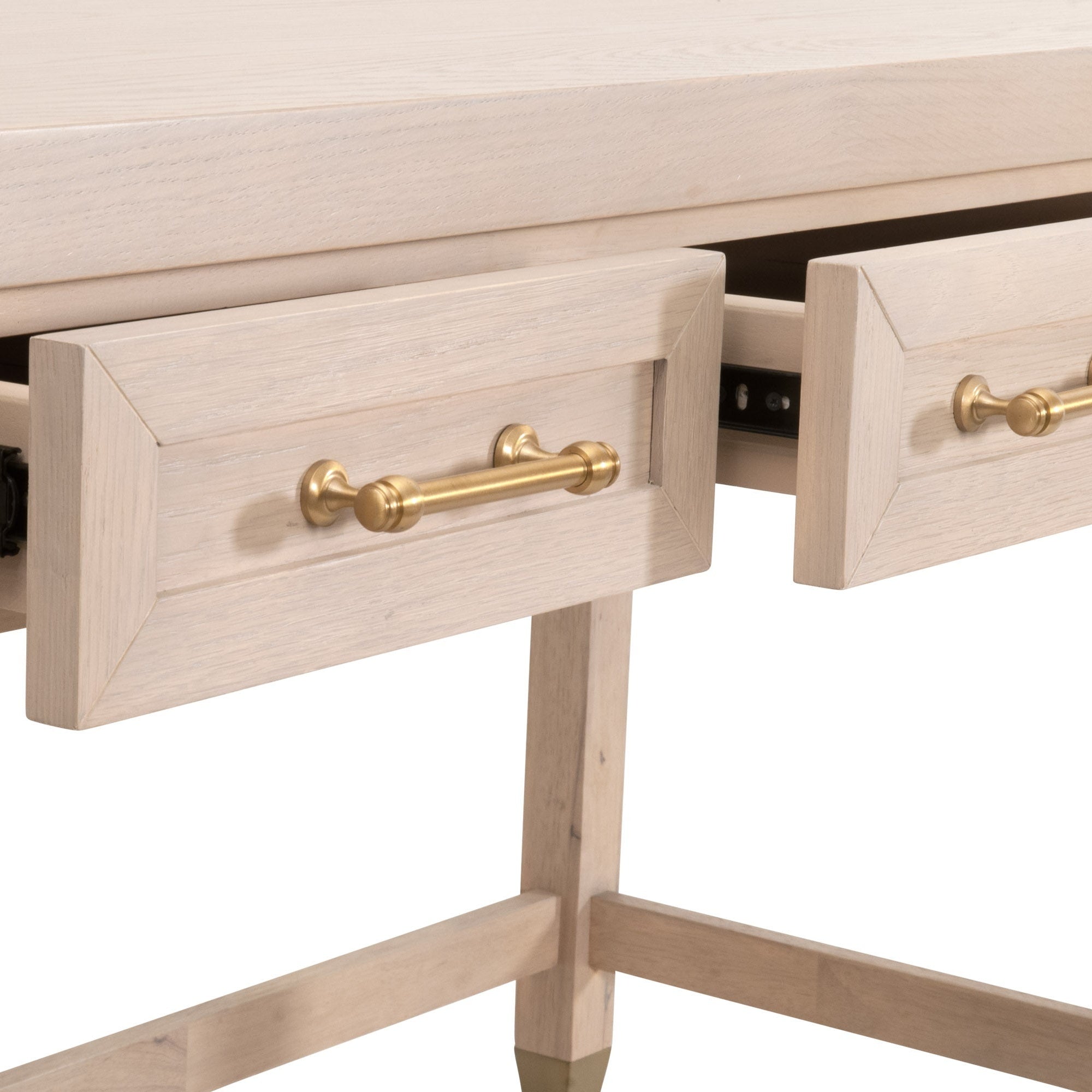 Close-up of Stella Desk drawers with brass handles in light wood finish by Essentials for Living
