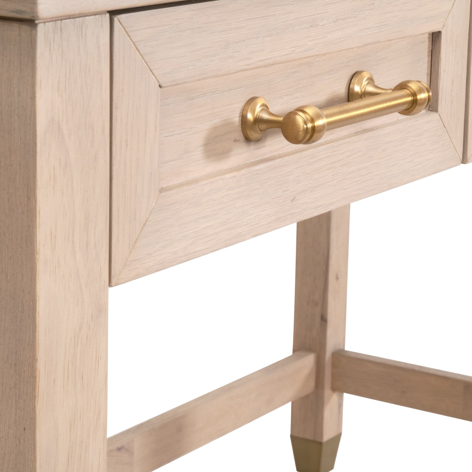 Close-up of the Stella Desk drawer featuring brushed brass handle on solid rubberwood with light wood finish by Essentials for Living