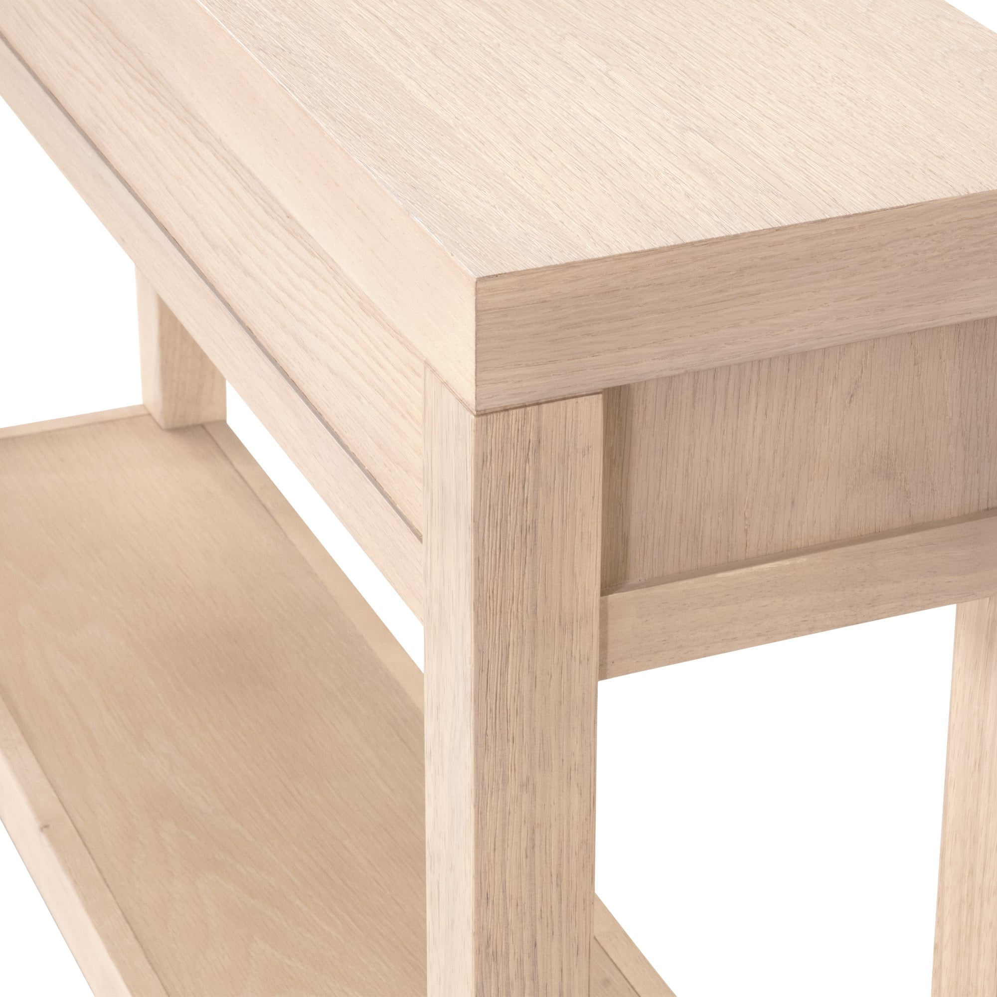 Close-up of Essentials for Living Stella Narrow Console Table in light honey oak with natural wood grain texture and brushed brass accents