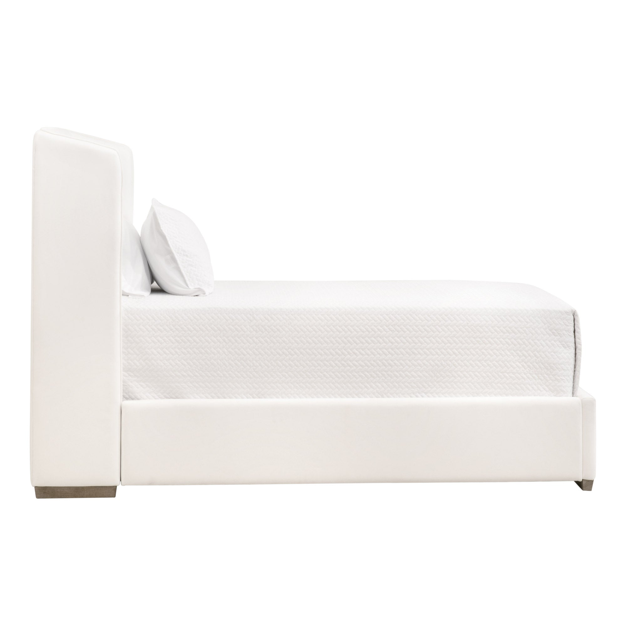 Minimalist white upholstered twin bed with a tall headboard and clean lines, ideal for modern bedrooms.