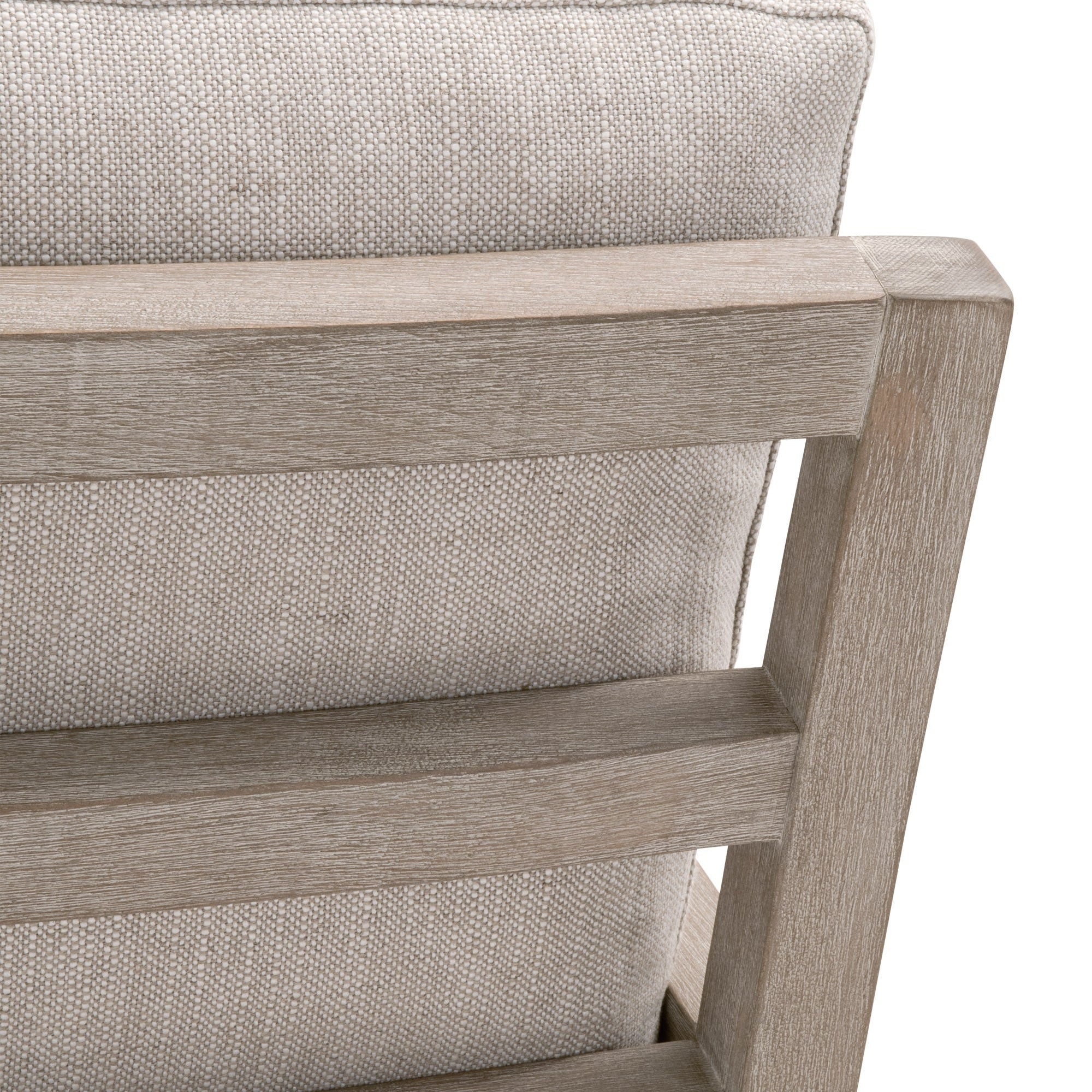 Close-up of natural gray beech wood frame and textured LiveSmart Boucle Snow upholstery on Essentials for Living chair