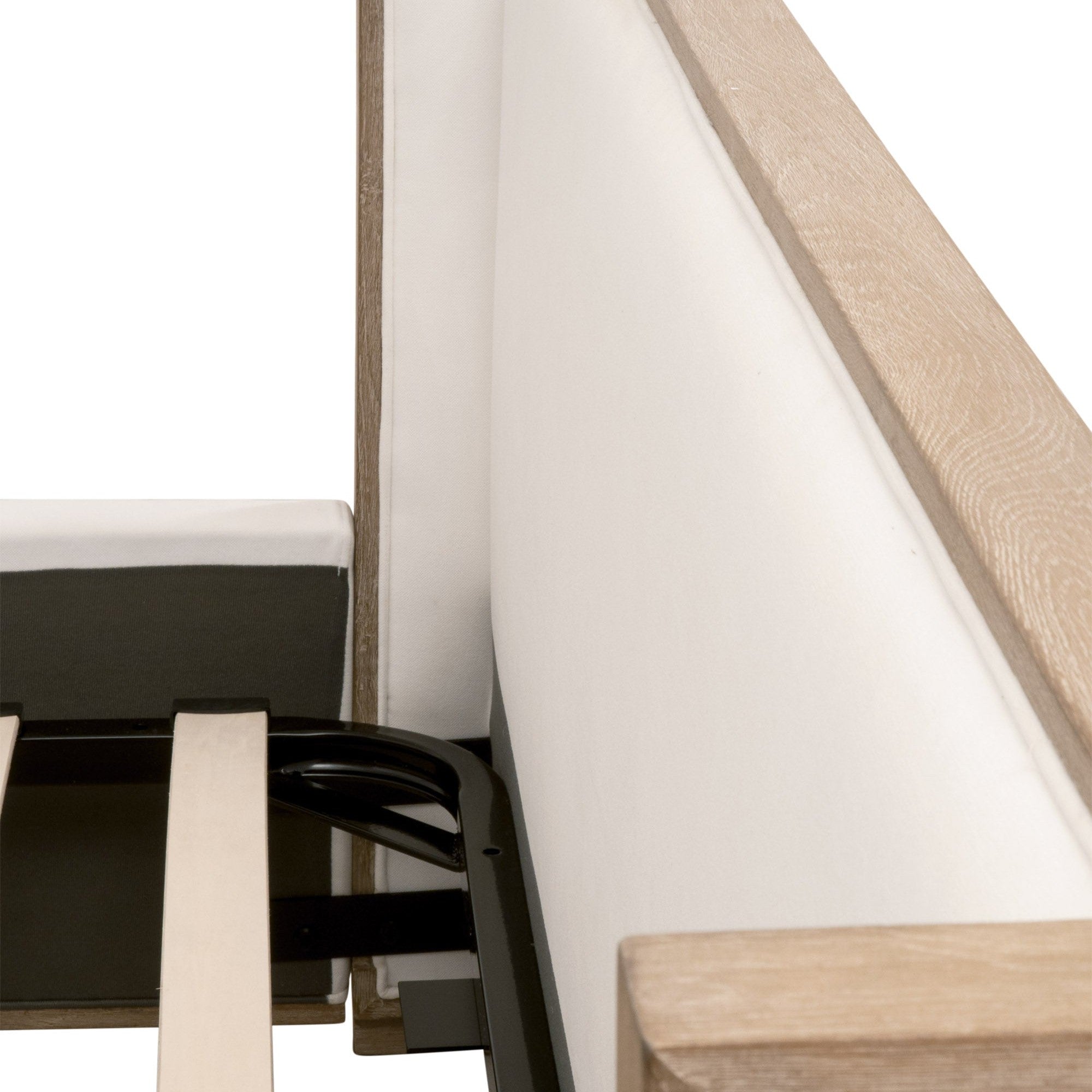 Close-up of Tailor Shelter Queen Bed corner showing natural gray oak frame and white upholstered panel with metal slats