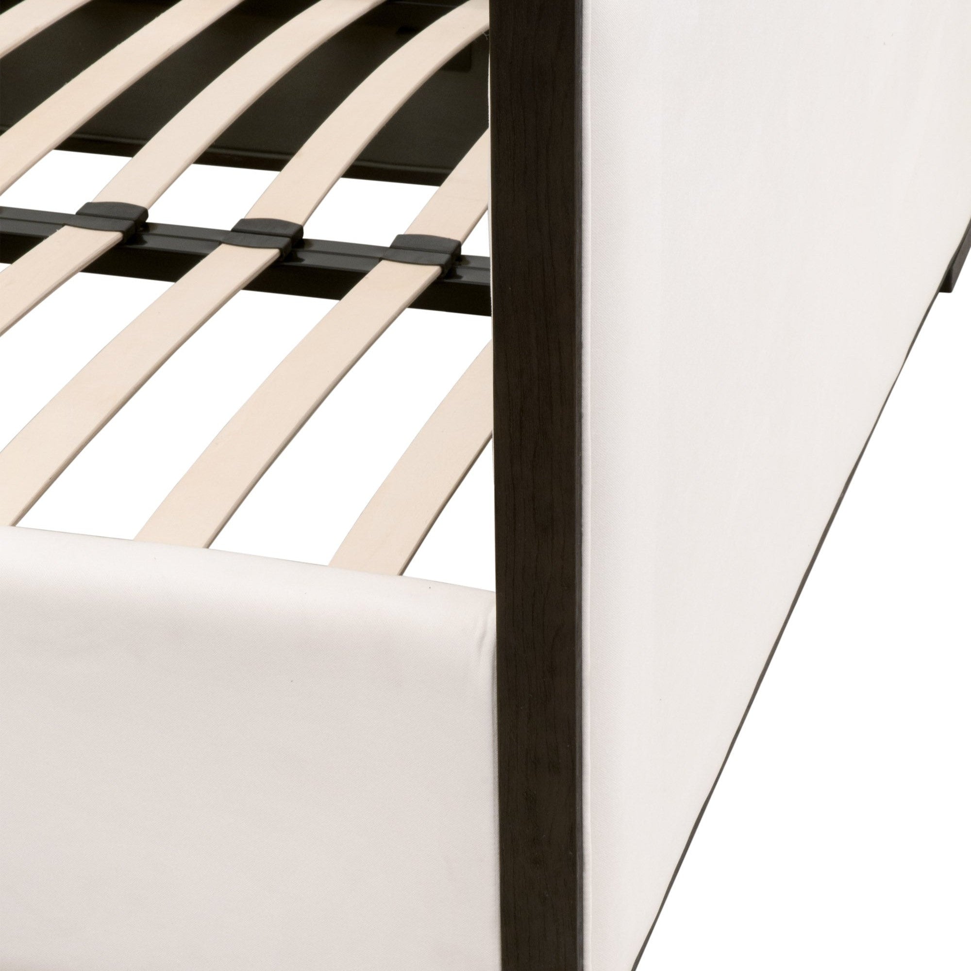 Close-up of Tailor Queen Bed corner showing LiveSmart Peyton-Pearl upholstery and matte brown oak frame by Essentials For Living