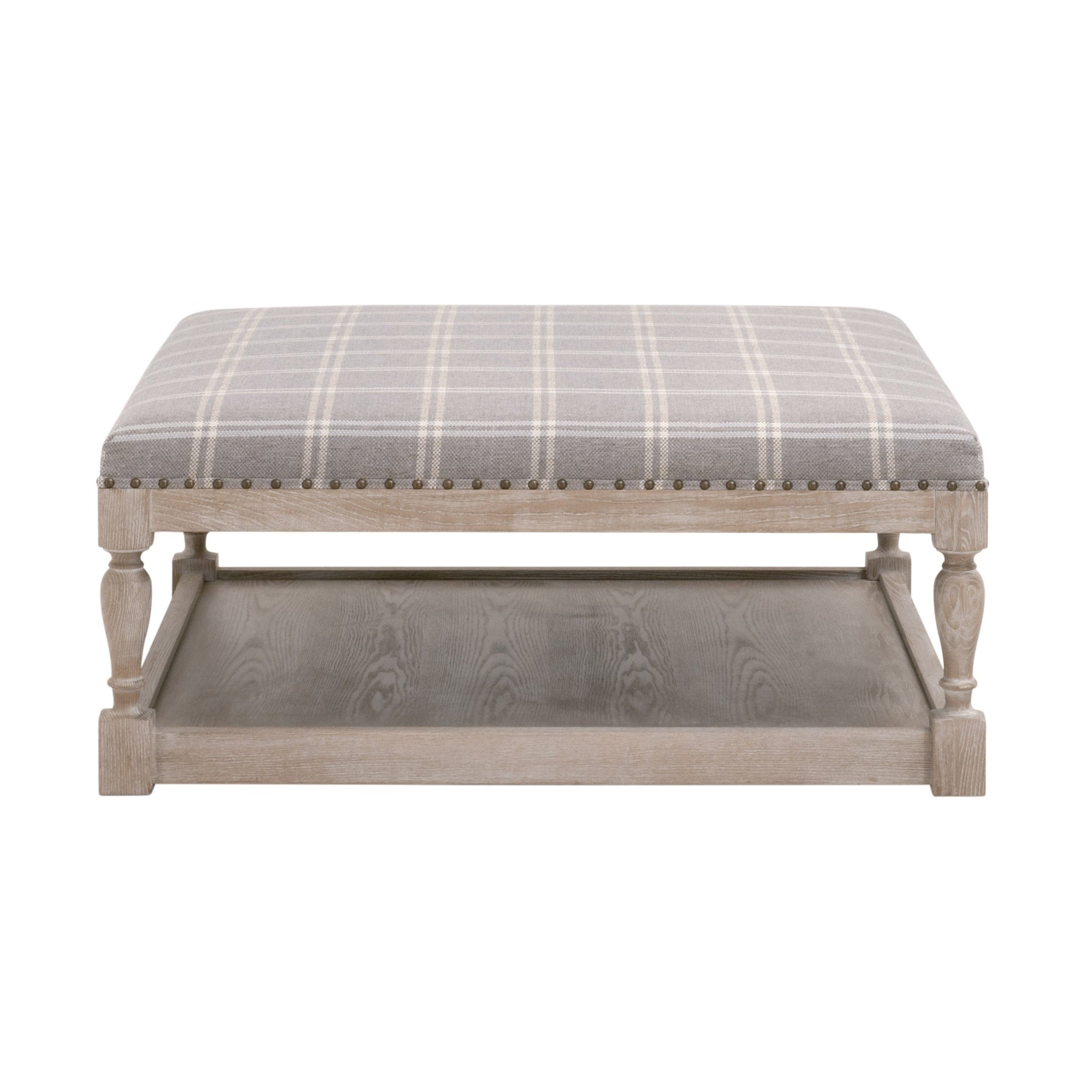 Square Townsend Upholstered Coffee Table with gray plaid fabric top, wood base, turned legs, and bottom shelf by Essentials for Living