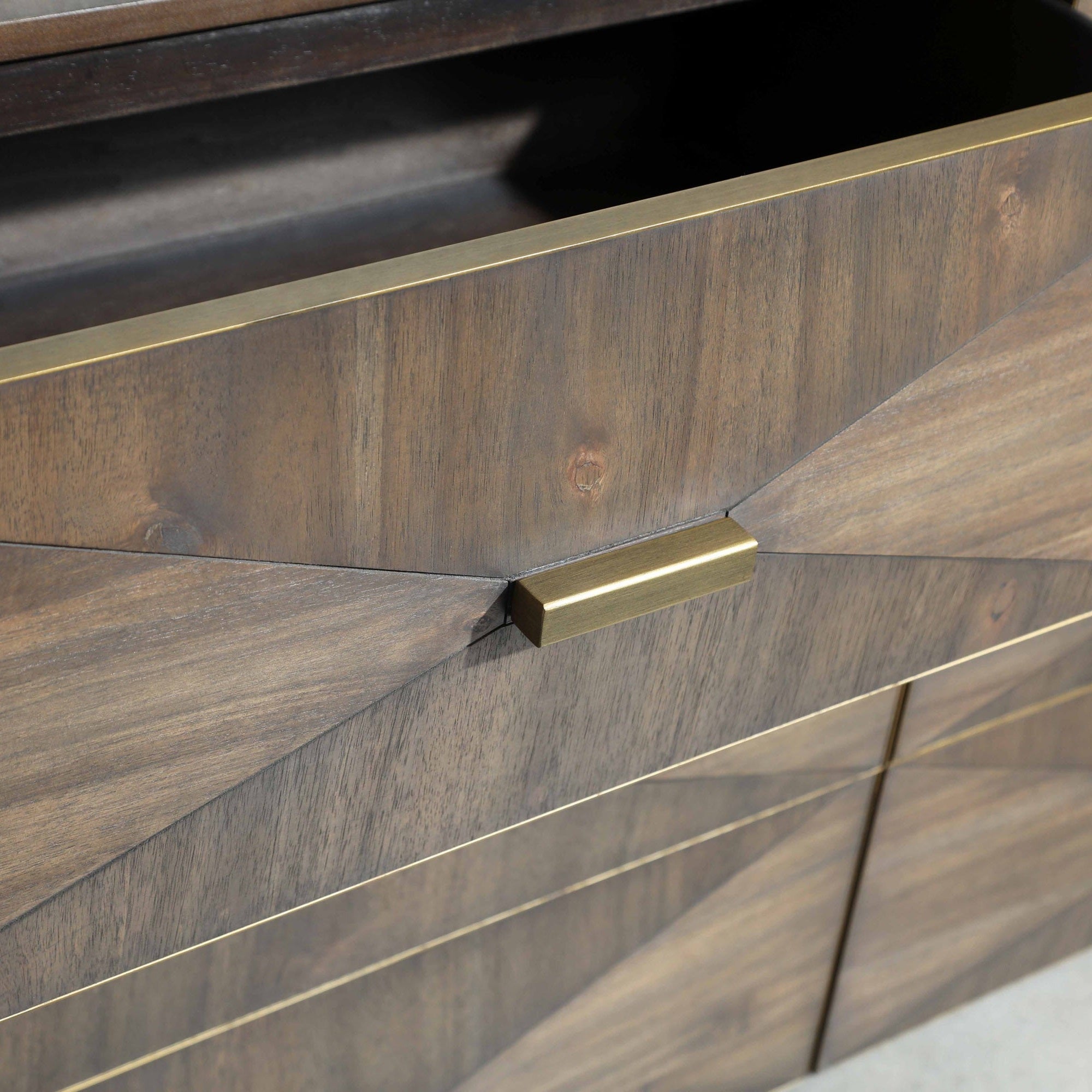 Close-up of Wynn 6-Drawer Double Dresser drawer with textured wood and brushed gold rectangular handle by Essentials for Living