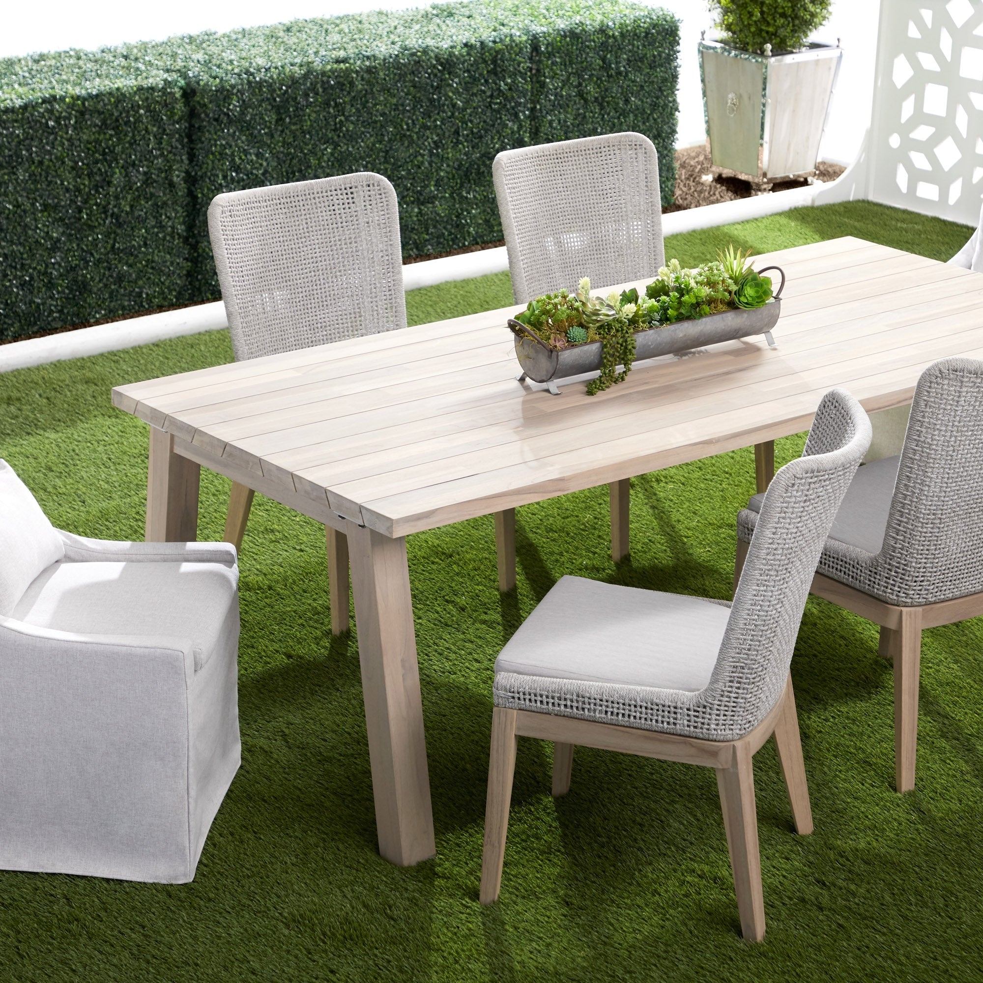 Adele Outdoor Slipcover Dining Chair with gray teak base and removable cushion in outdoor dining setup Essentials for Living