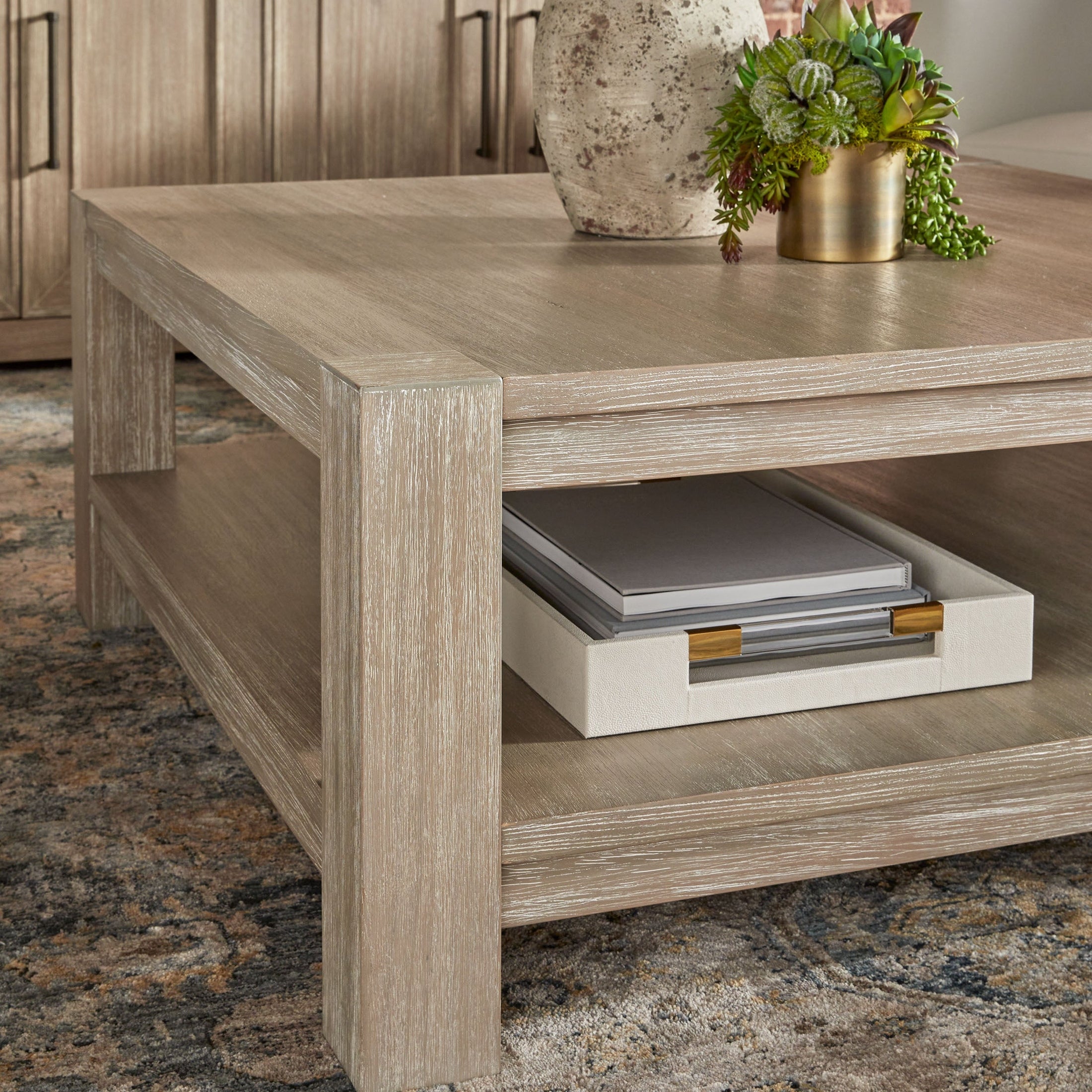 Adler Square Coffee Table with natural gray distressed finish and lower shelf, solid beech wood by Essentials for Living