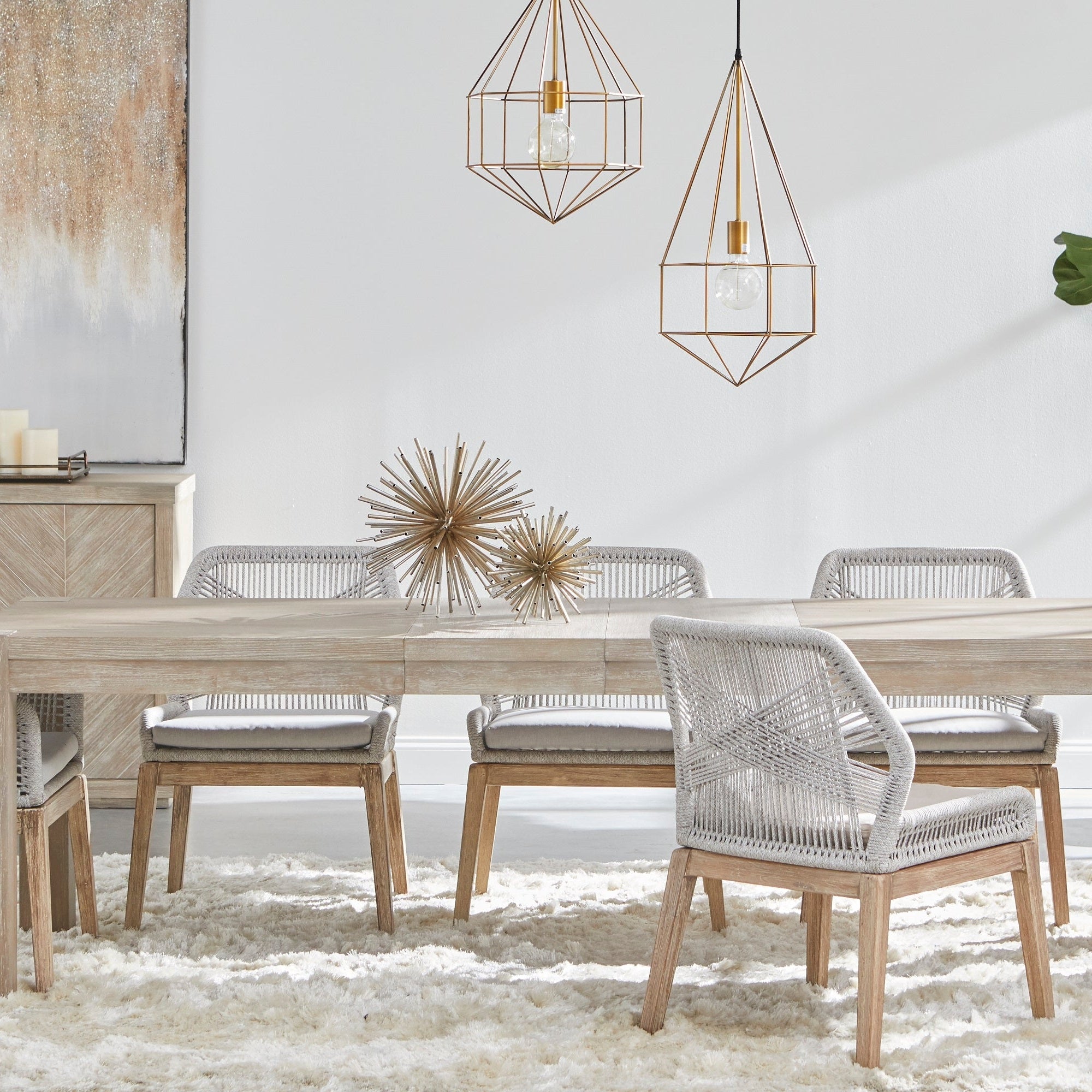 Adler Extension Dining Table in light honey oak with woven chairs and modern pendant lights Essentials for Living