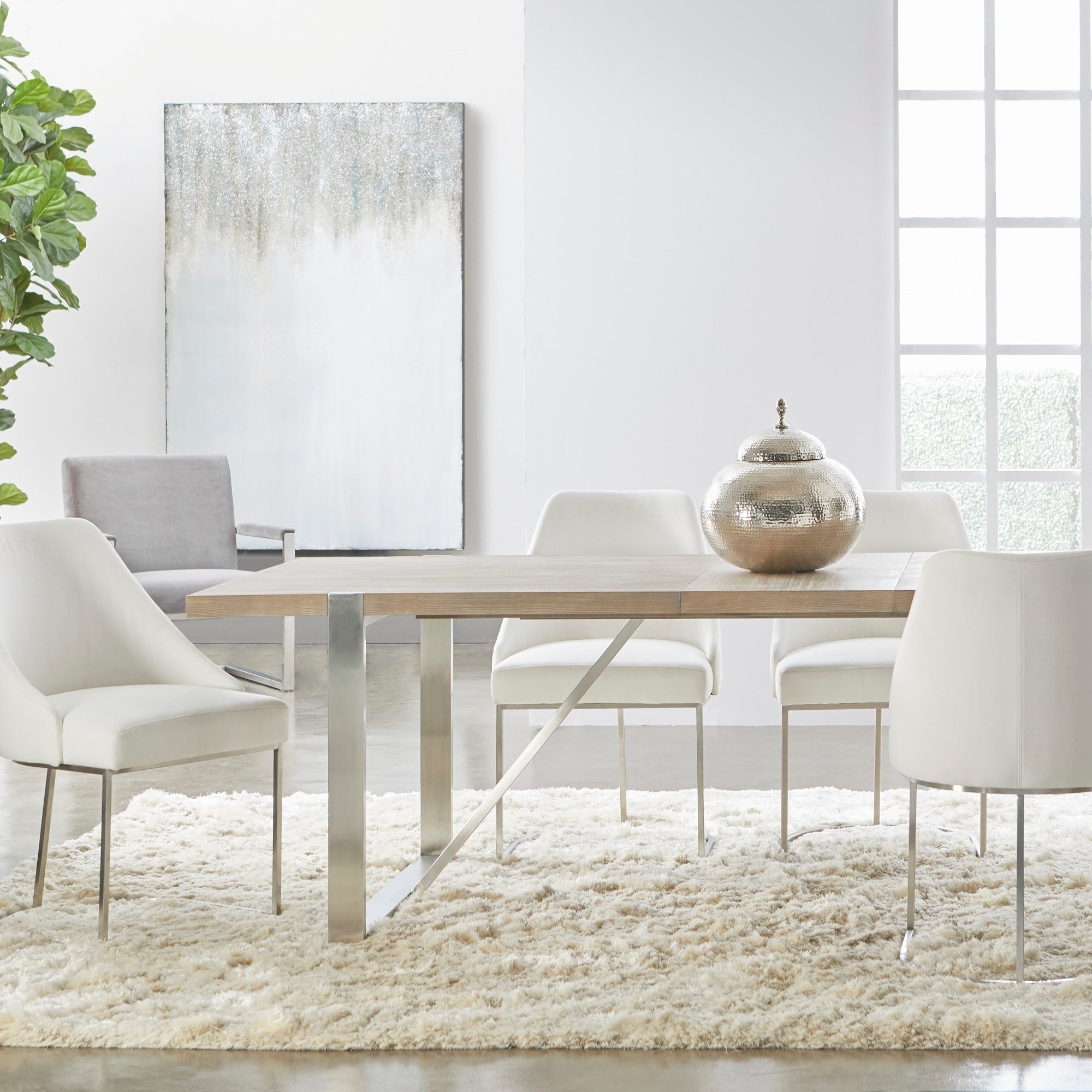 Atlas Media Sideboard in natural gray acacia with stainless steel base in a modern dining room by Essentials for Living