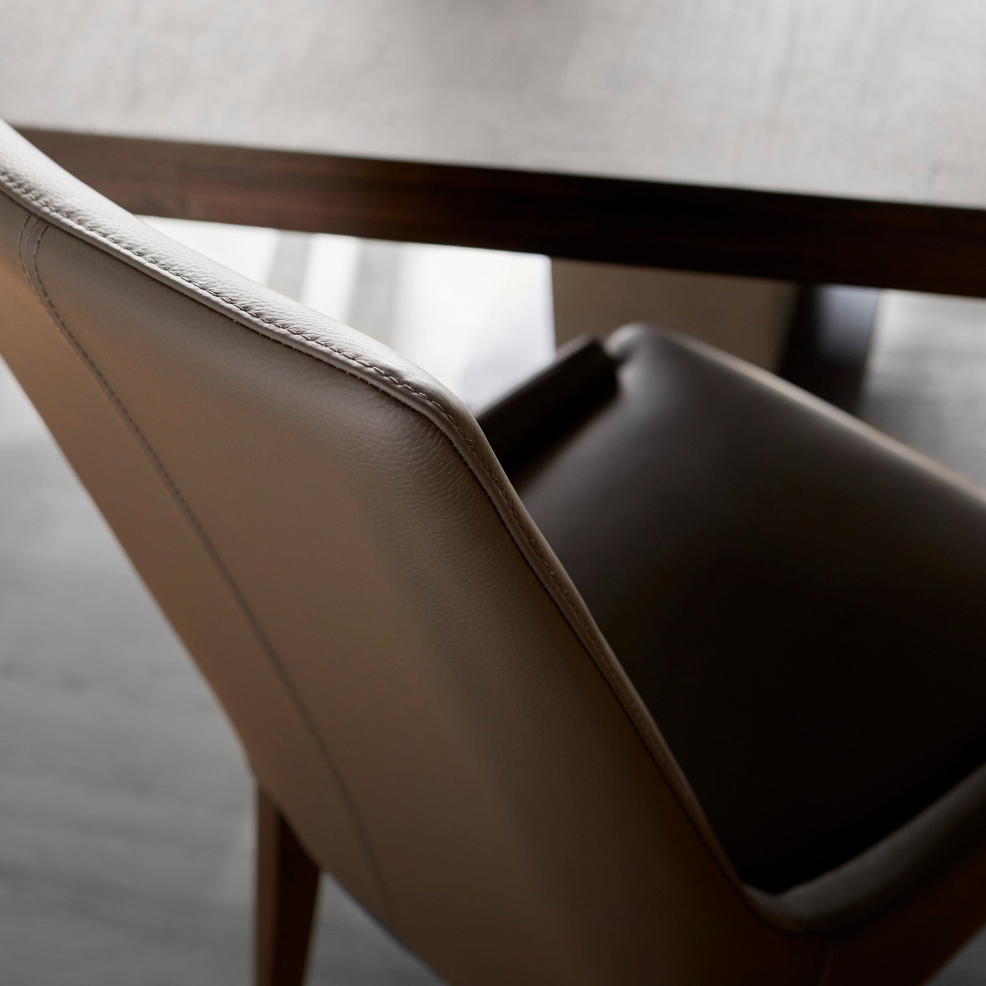 Close-up of dark umber leather Aurora Dining Chair with dark wenge wood legs, set of 2 by Essentials For Living