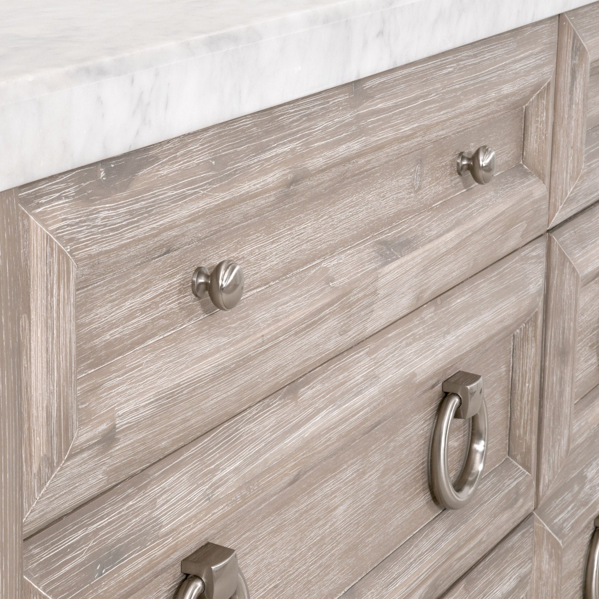 Close-up of brushed steel hardware on Azure Carrera 6-Drawer Double Dresser with gray acacia wood by Essentials For Living