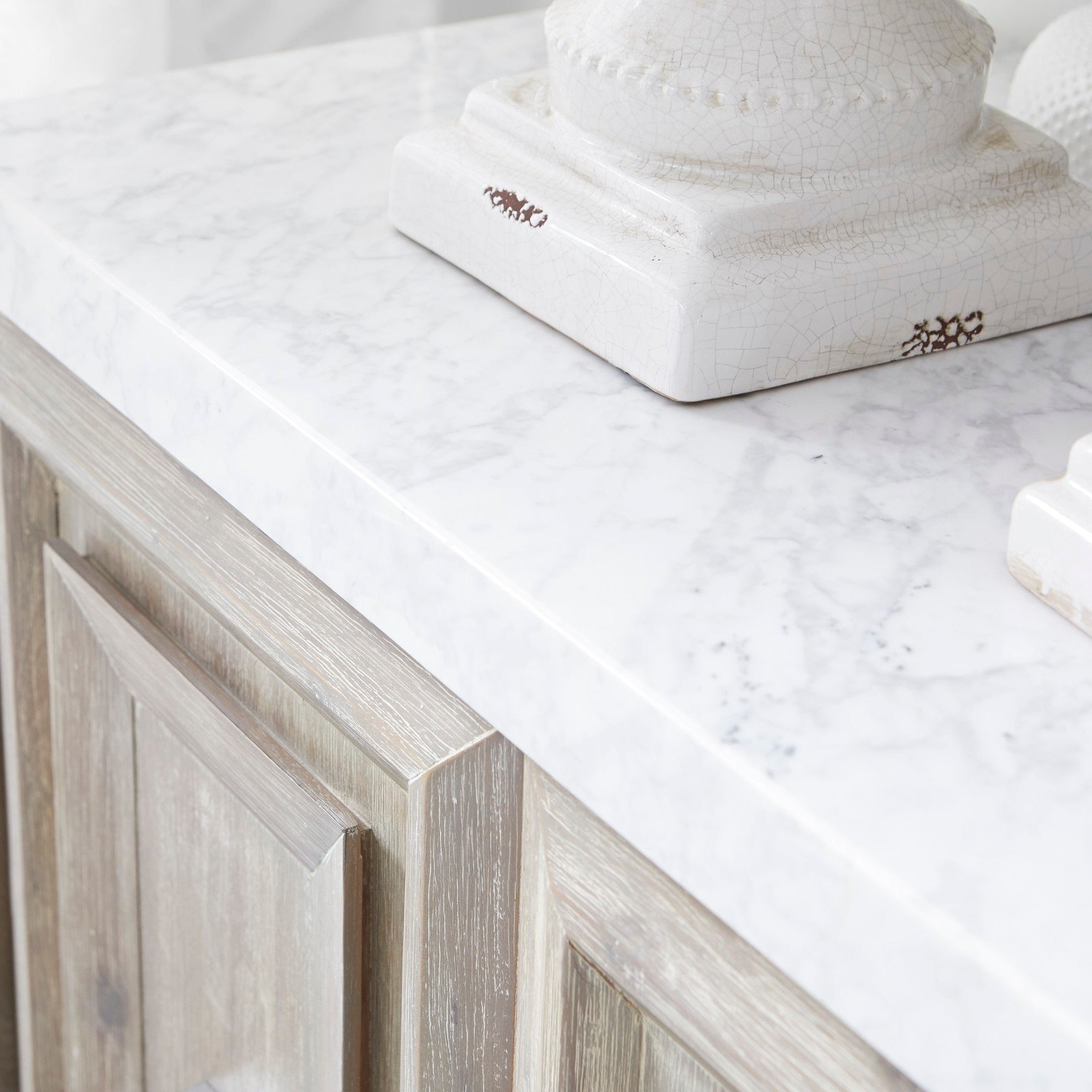 Close-up of Azure Carrera Media Sideboard with Italian Carrera marble top and navy lacquered wood by Essentials for Living