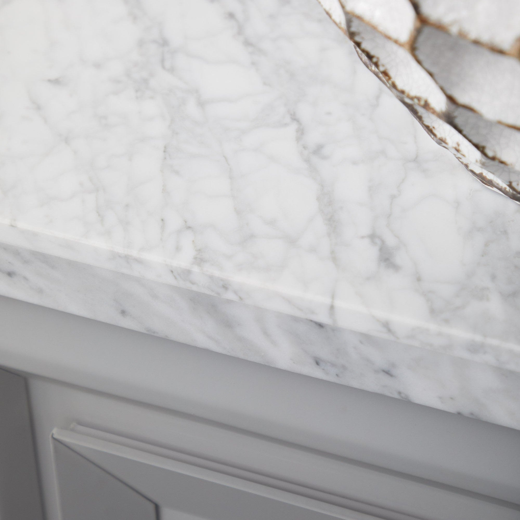 Close-up of the genuine Italian Carrera marble top on the Azure Carrera Media Sideboard by Essentials for Living