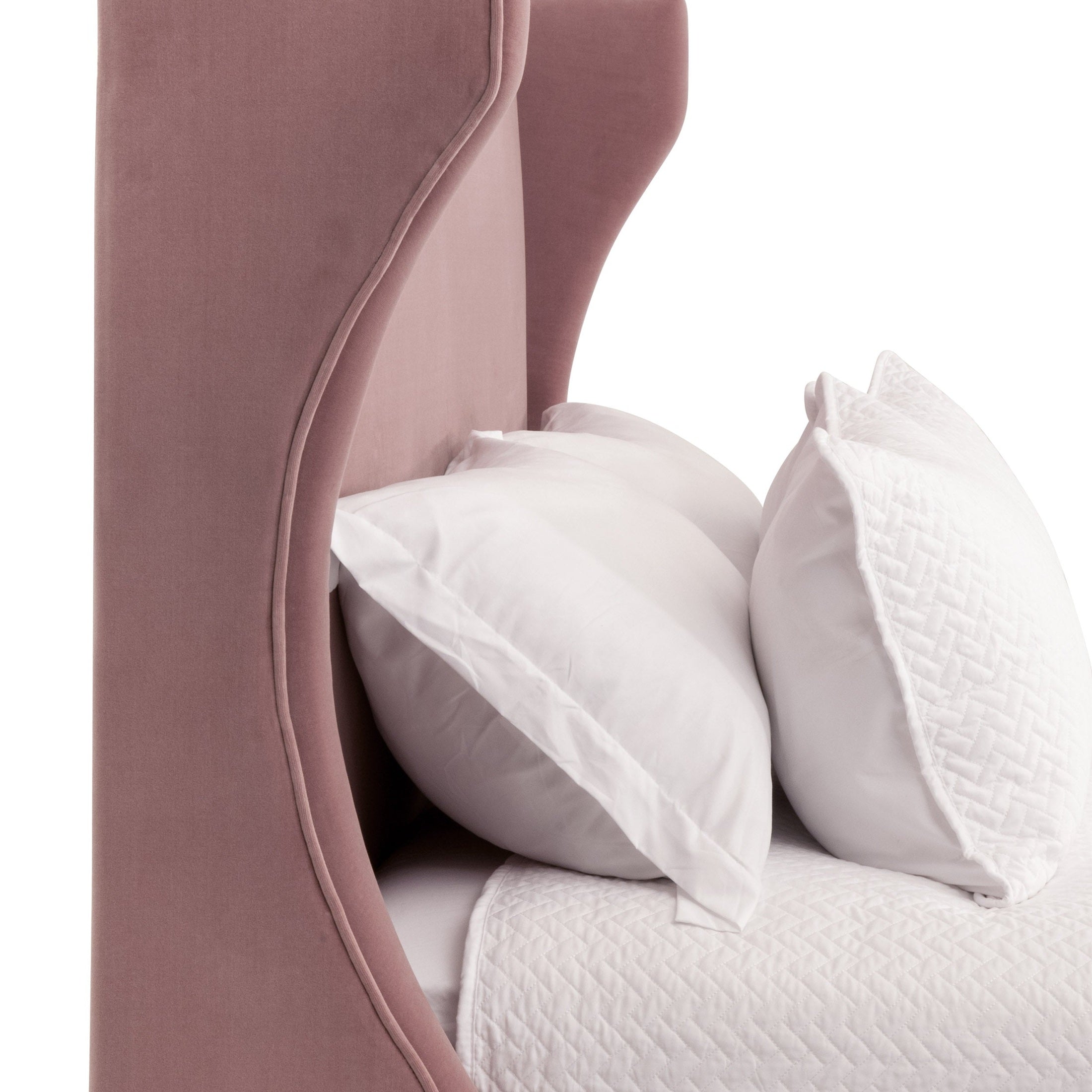 Side view of Balboa Queen Bed with curved wingback headboard and white pillows by Essentials for Living.