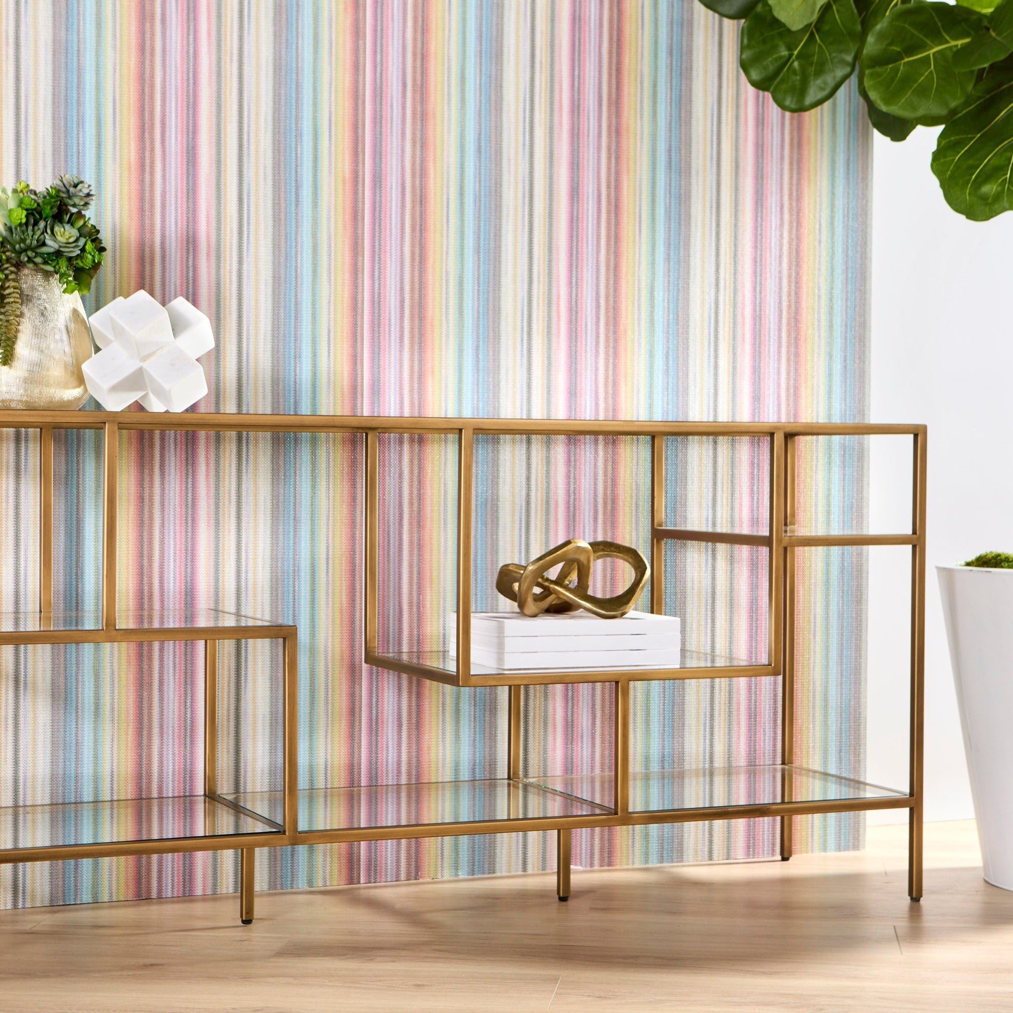 Beakman Low Bookcase with brass metal frame and glass shelves in a modern geometric design by Essentials for Living