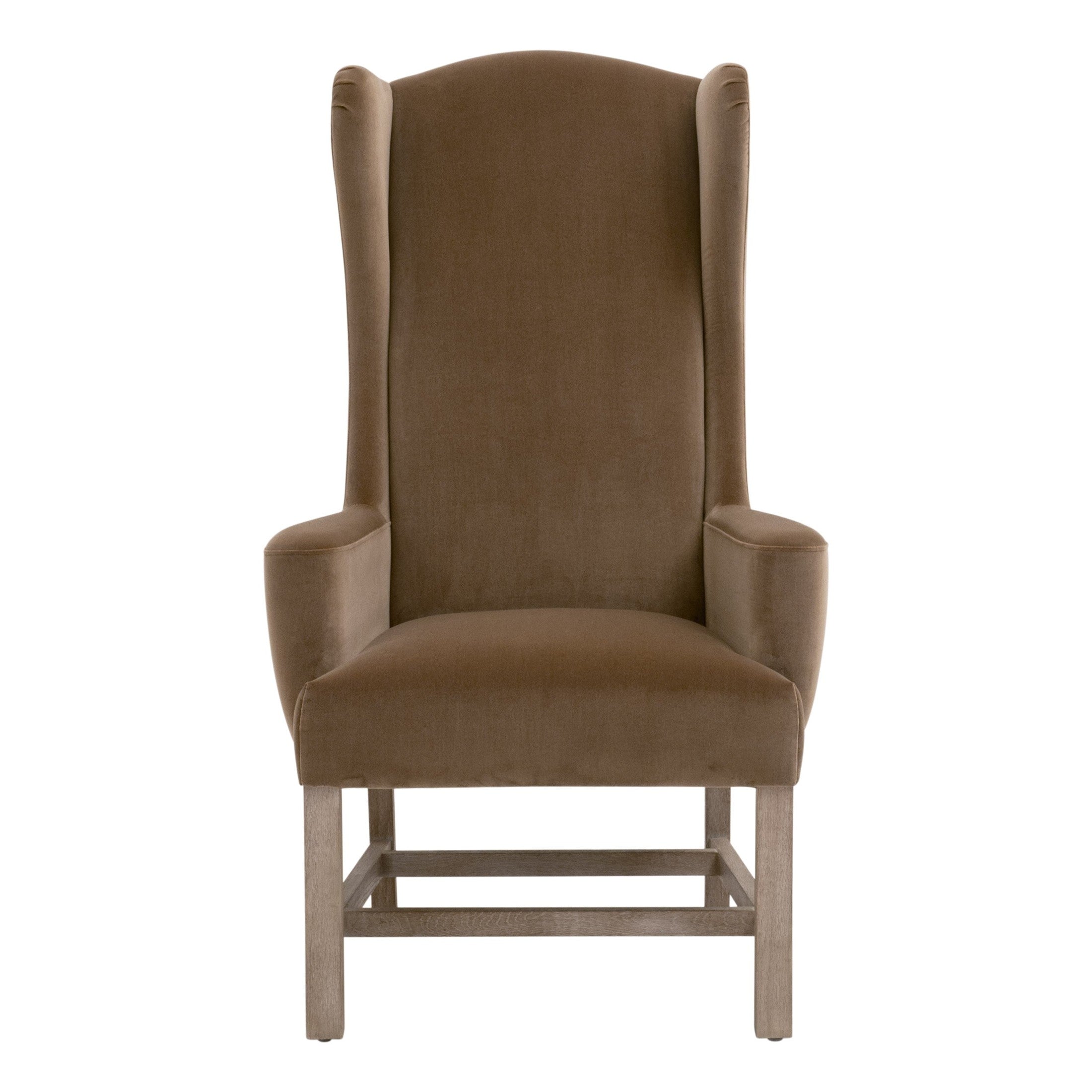 Bennett Arm Chair in dark caramel velvet with solid gray oak legs and wingback design by Essentials For Living