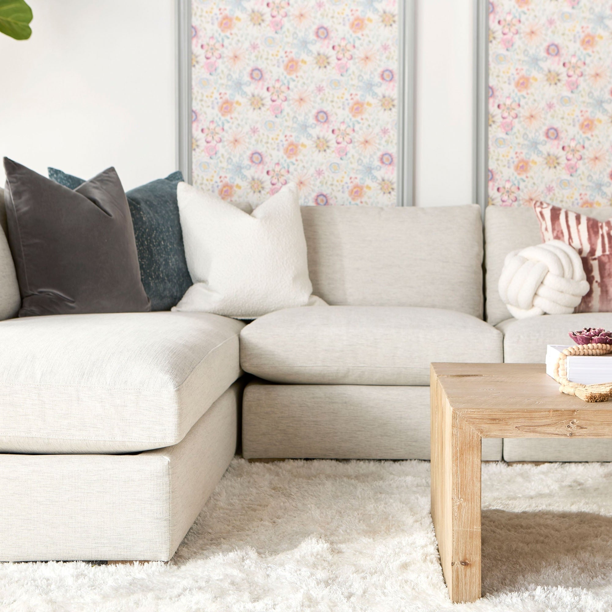 Light gray and white armless modular chair with reversible cushions and natural gray oak feet by Essentials for Living