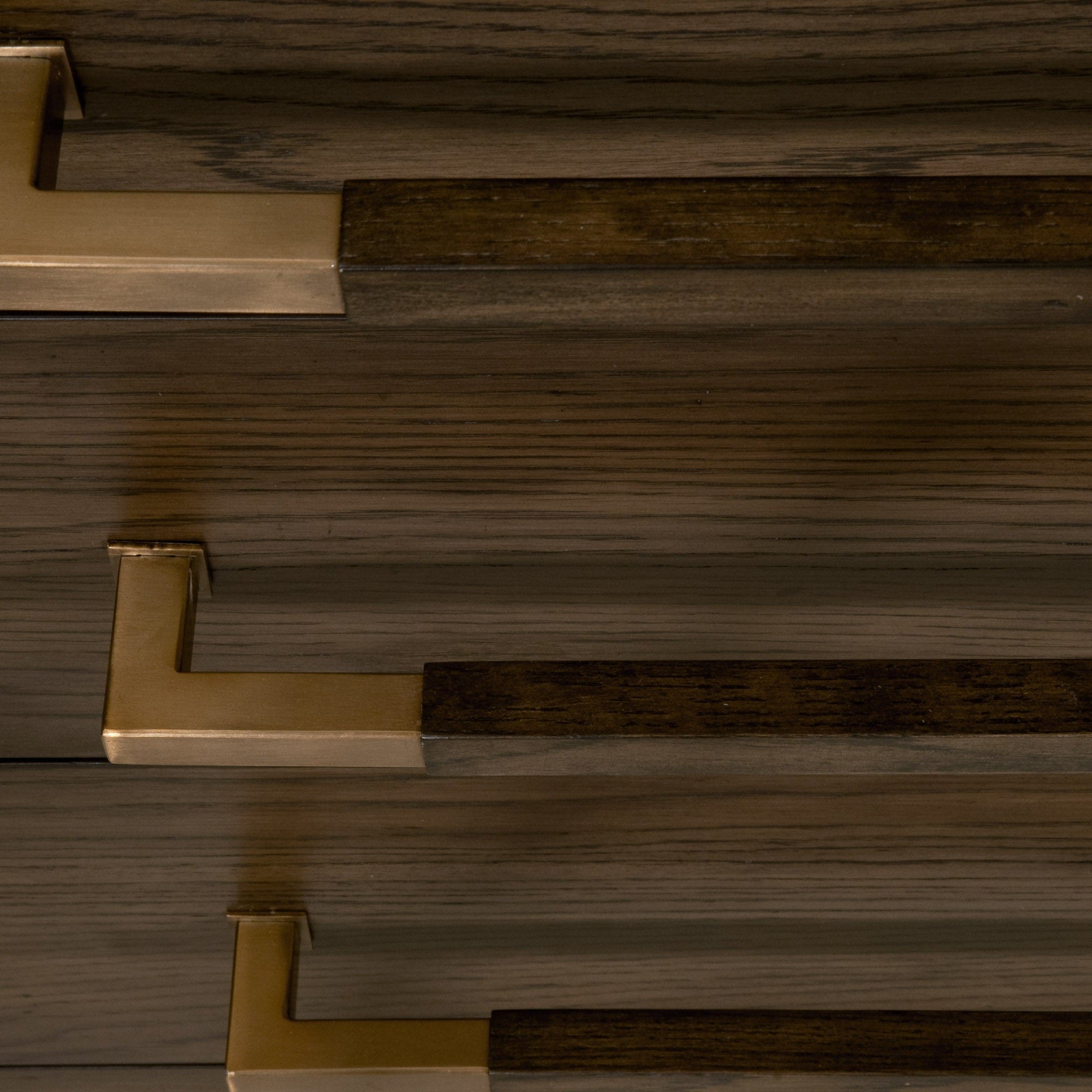 Close-up of aged brass drawer pulls on Cambria 8-Drawer Double Dresser by Essentials for Living.