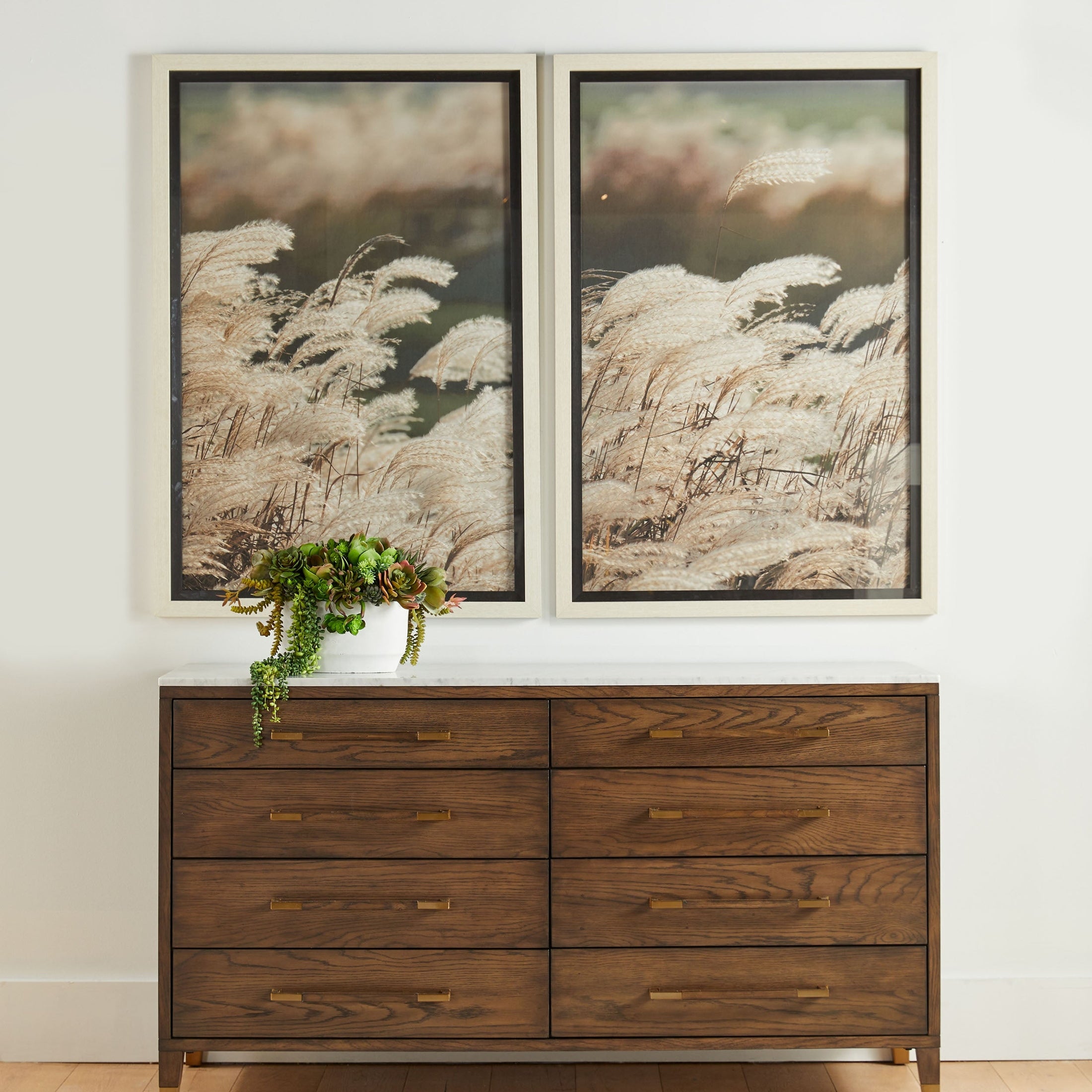 Cambria 8-Drawer Double Dresser with Bianco marble top and aged brass pulls by Essentials For Living.