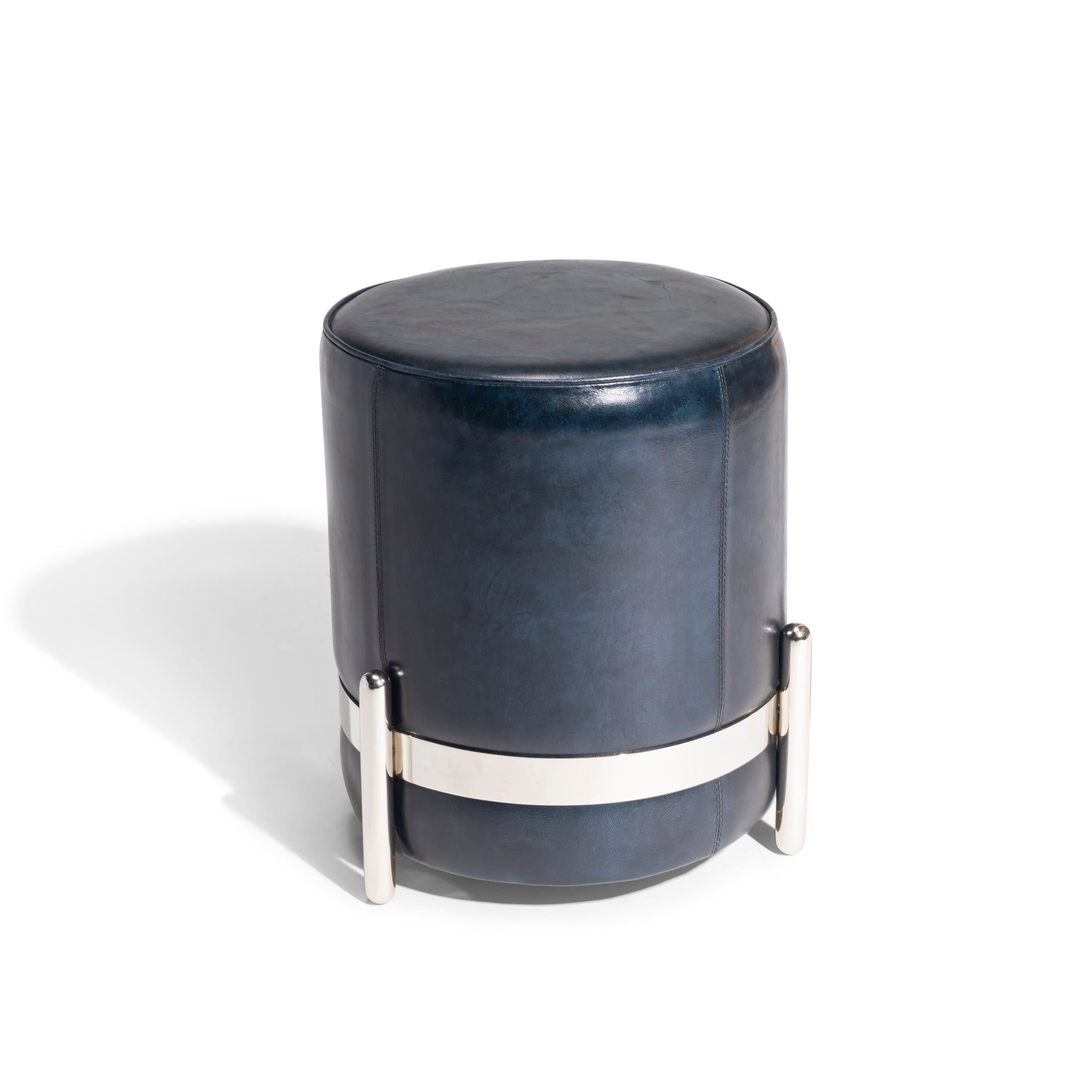 Navy blue leather cylindrical Cayman Stool with polished nickel base for seating or decor by GO HOME