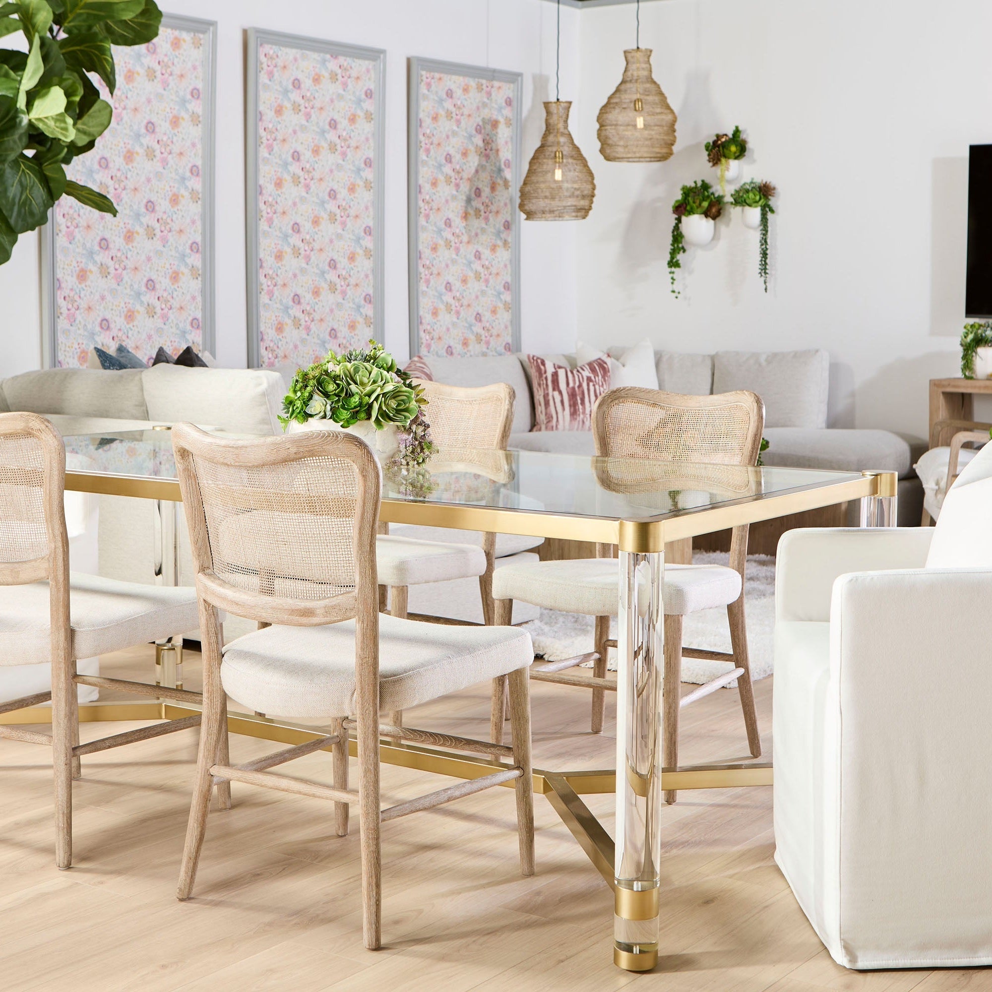 Set of 2 Cela Dining Chairs by Essentials For Living with woven cane back and bisque upholstered seat in bright dining room