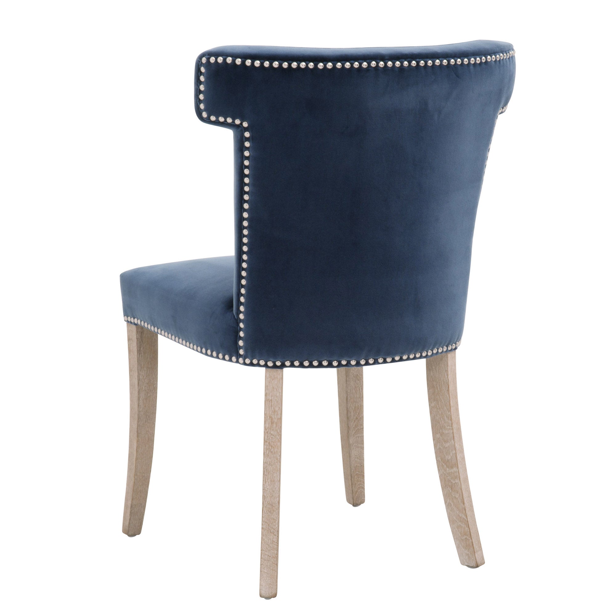 Essentials for Living Celina Dining Chair in denim blue velvet with nailhead trim and natural gray oak legs viewed from the back
