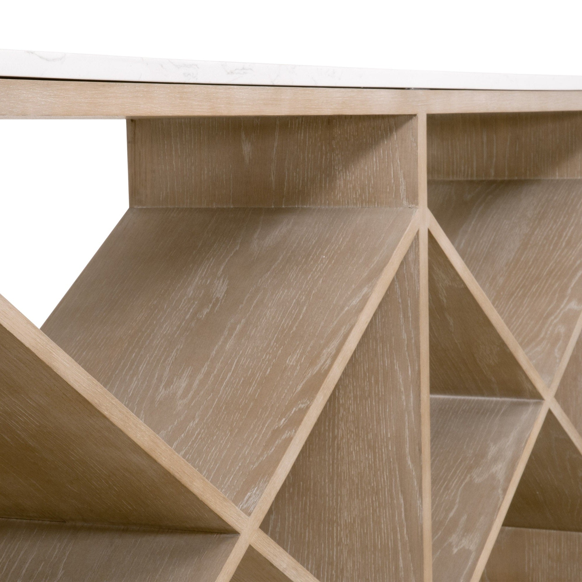 Close-up of the smoke gray oak sculptural “X” base detail on a white quartz topped console table