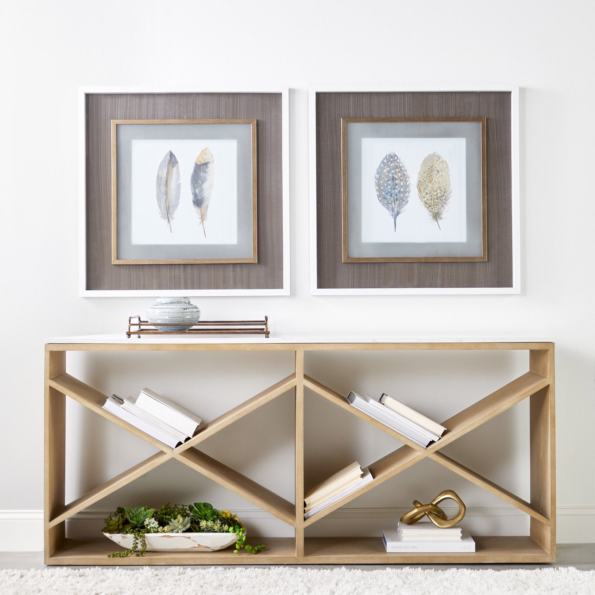 Essentials For Living Cellar Console Table in smoke gray oak with white quartz top styled with decor and framed art above