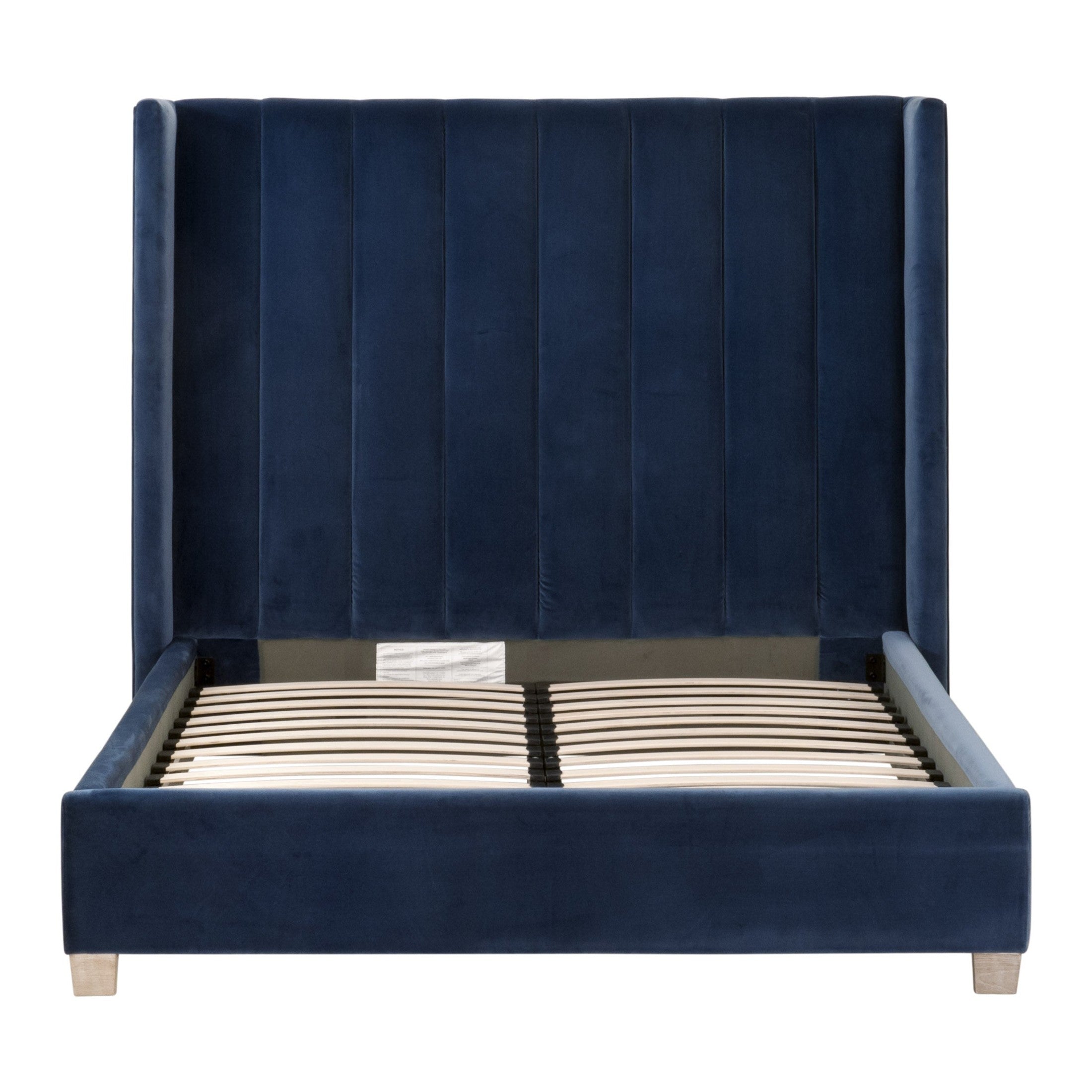 Luxurious navy velvet Chandler Queen Bed with tall wingback headboard and wooden feet by Essentials For Living