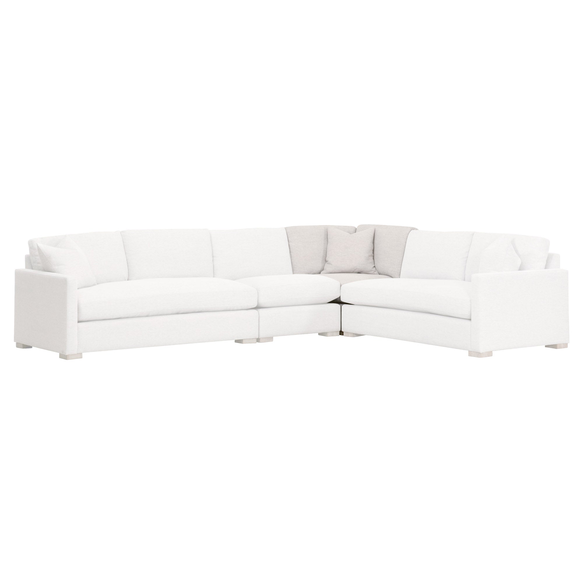 Light gray and white modular corner sectional sofa with plush cushions and a coordinating throw pillow by Essentials for Living