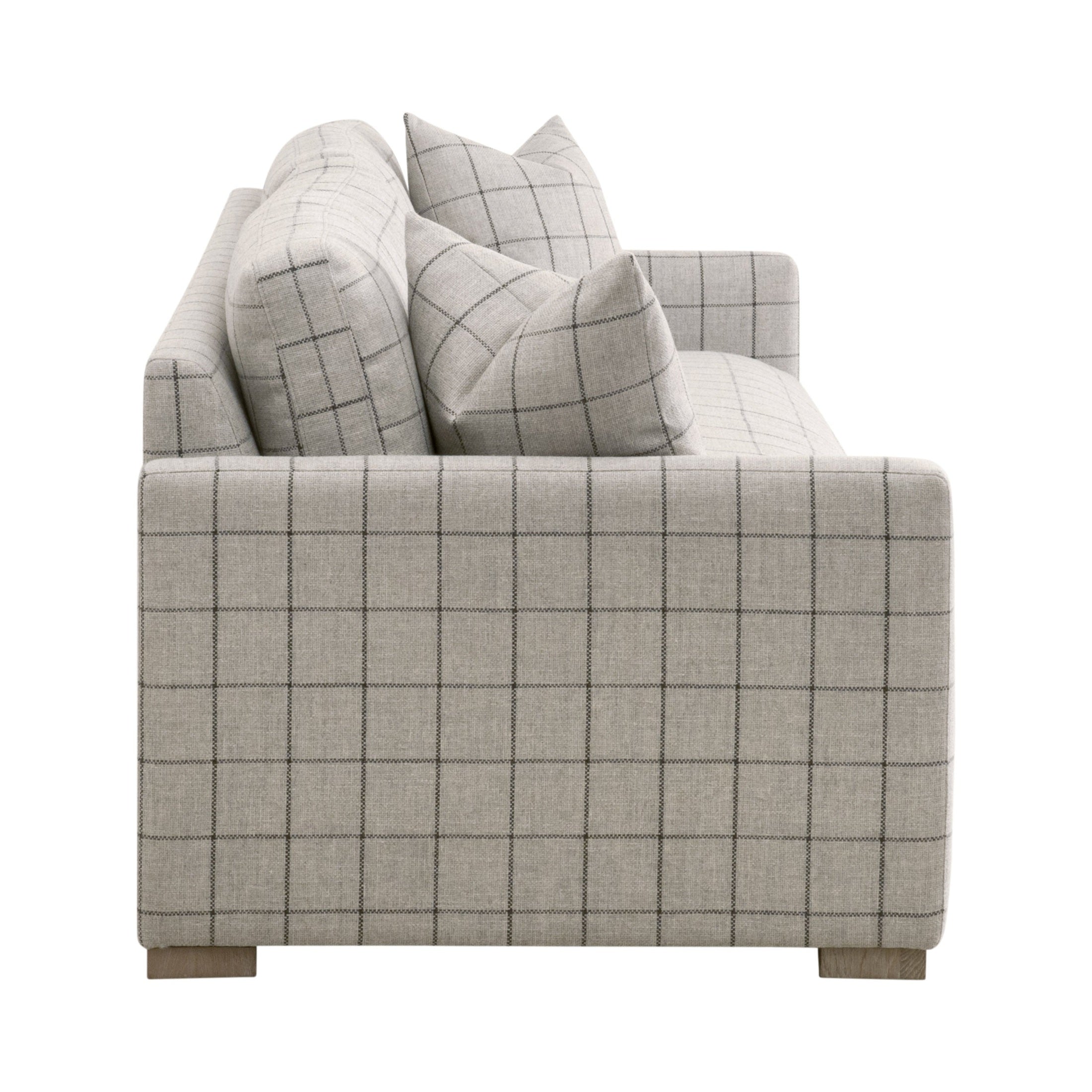 Side view of Clara 86 slim arm sofa with stone basketweave upholstery and natural gray oak feet by Essentials For Living