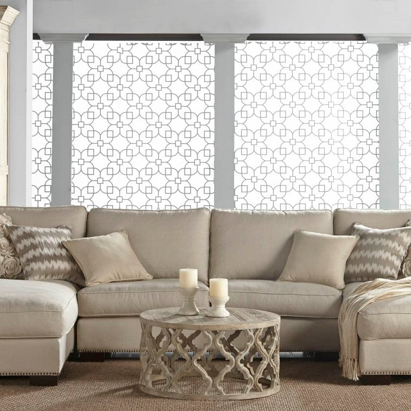 Essentials for Living Clover End Table in smoke gray reclaimed elm with carved quatrefoil base in stylish living room setting