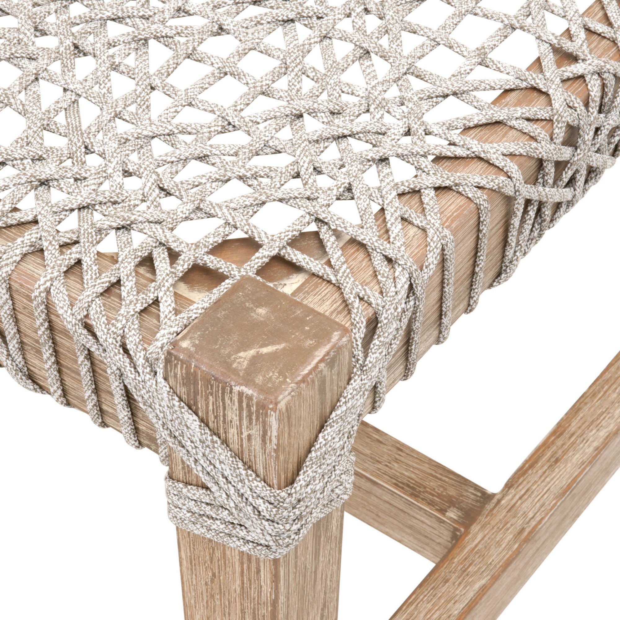 Close-up of Costa Bench white and taupe woven polypropylene seat with distressed natural gray mahogany frame by Essentials for Living